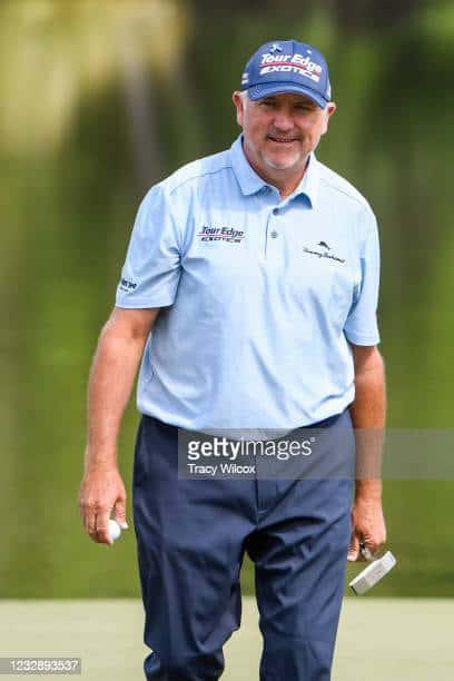Professional Golfer, Ken Duke, Taking A Swing On The Golf Course. Wallpaper