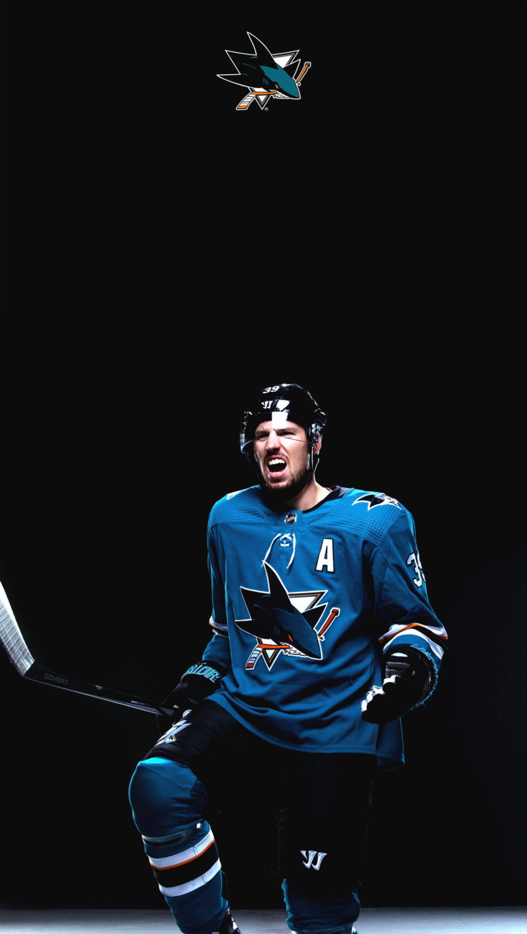 Professional Ice Hockey Center Logan Couture Alternate Captain Portrait Wallpaper