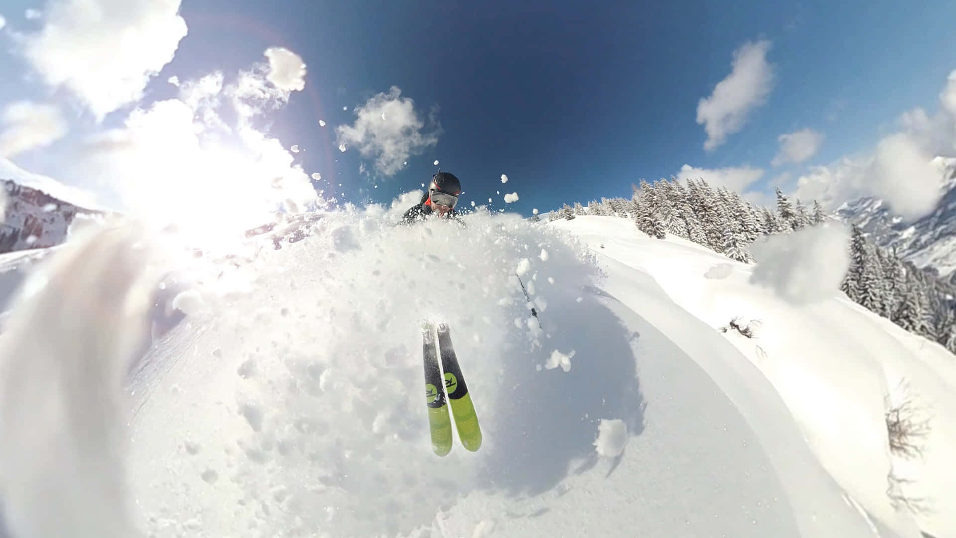 Professional Skier Making A Downhill Dash Wallpaper