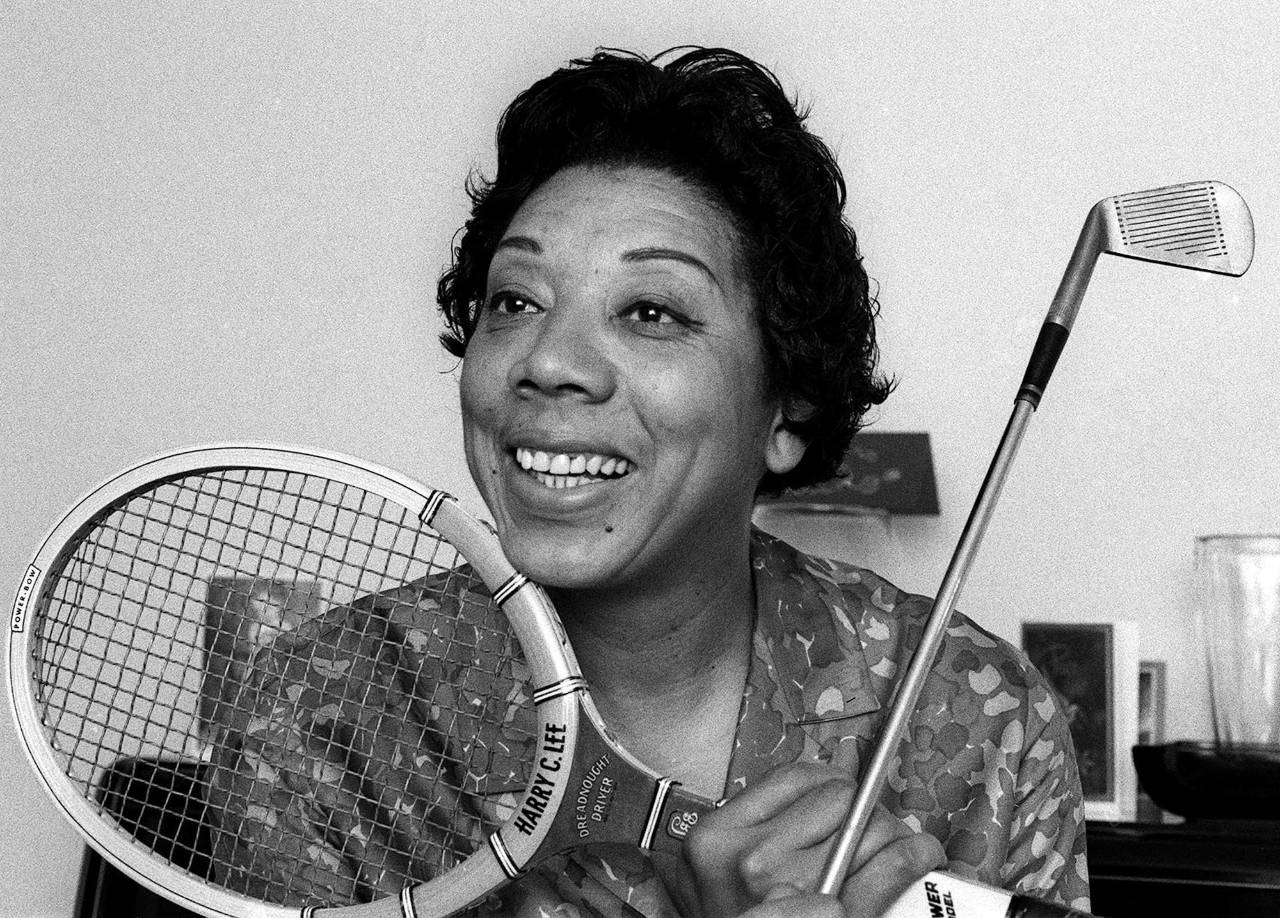 Caption: Althea Gibson, groundbreaking tennis and golf professional. Wallpaper