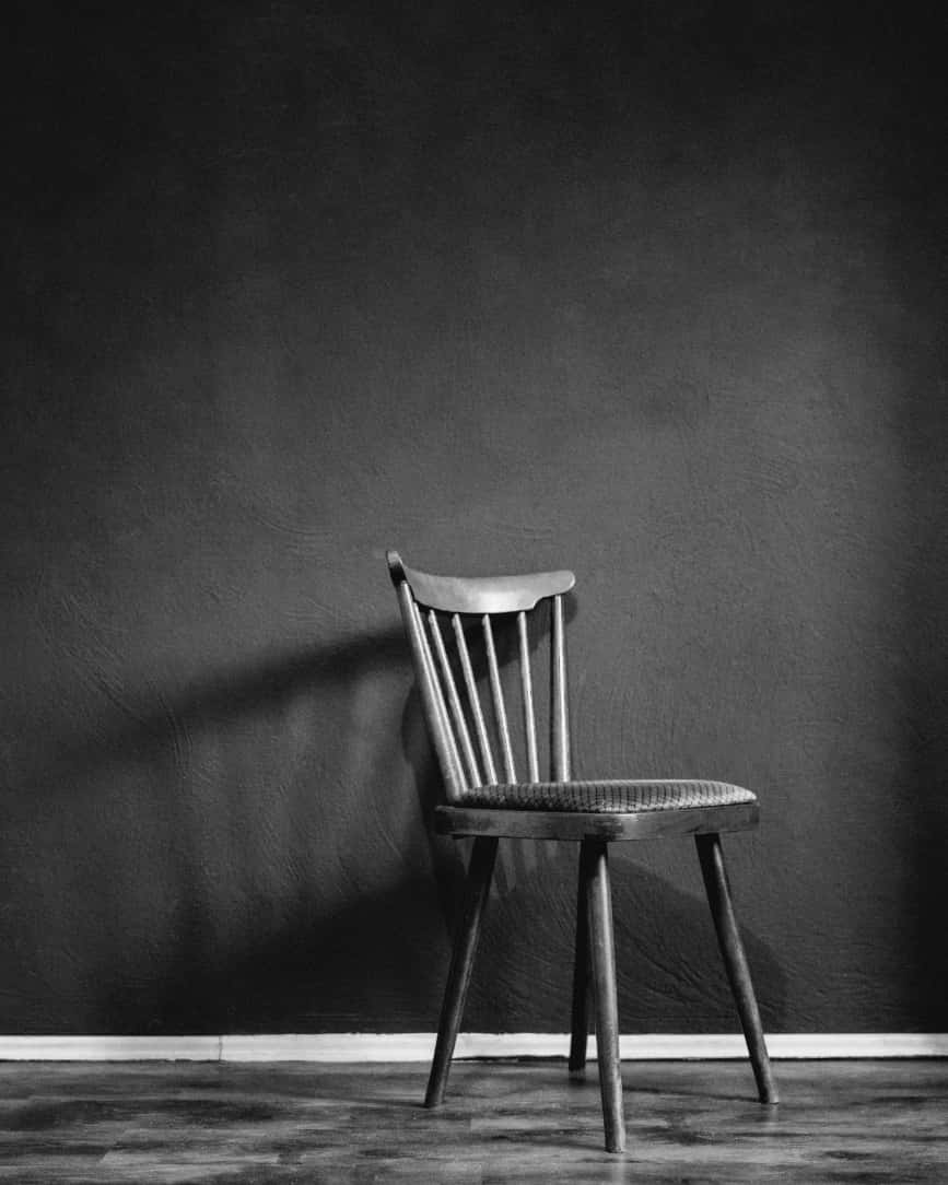 A Chair In A Black And White Photograph