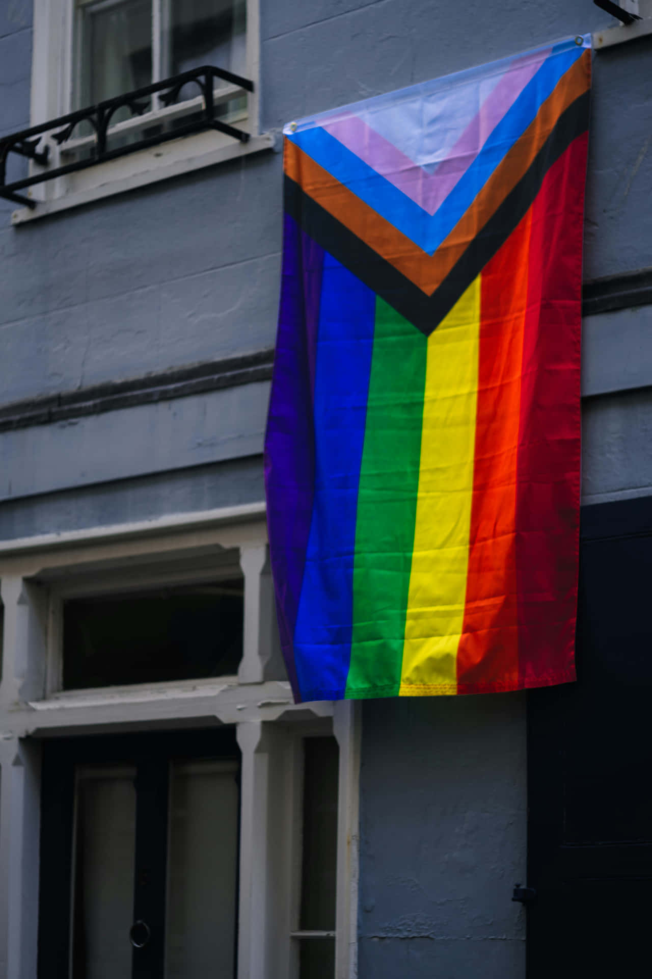 Progressive_ Pride_ Flag_ Displayed Wallpaper