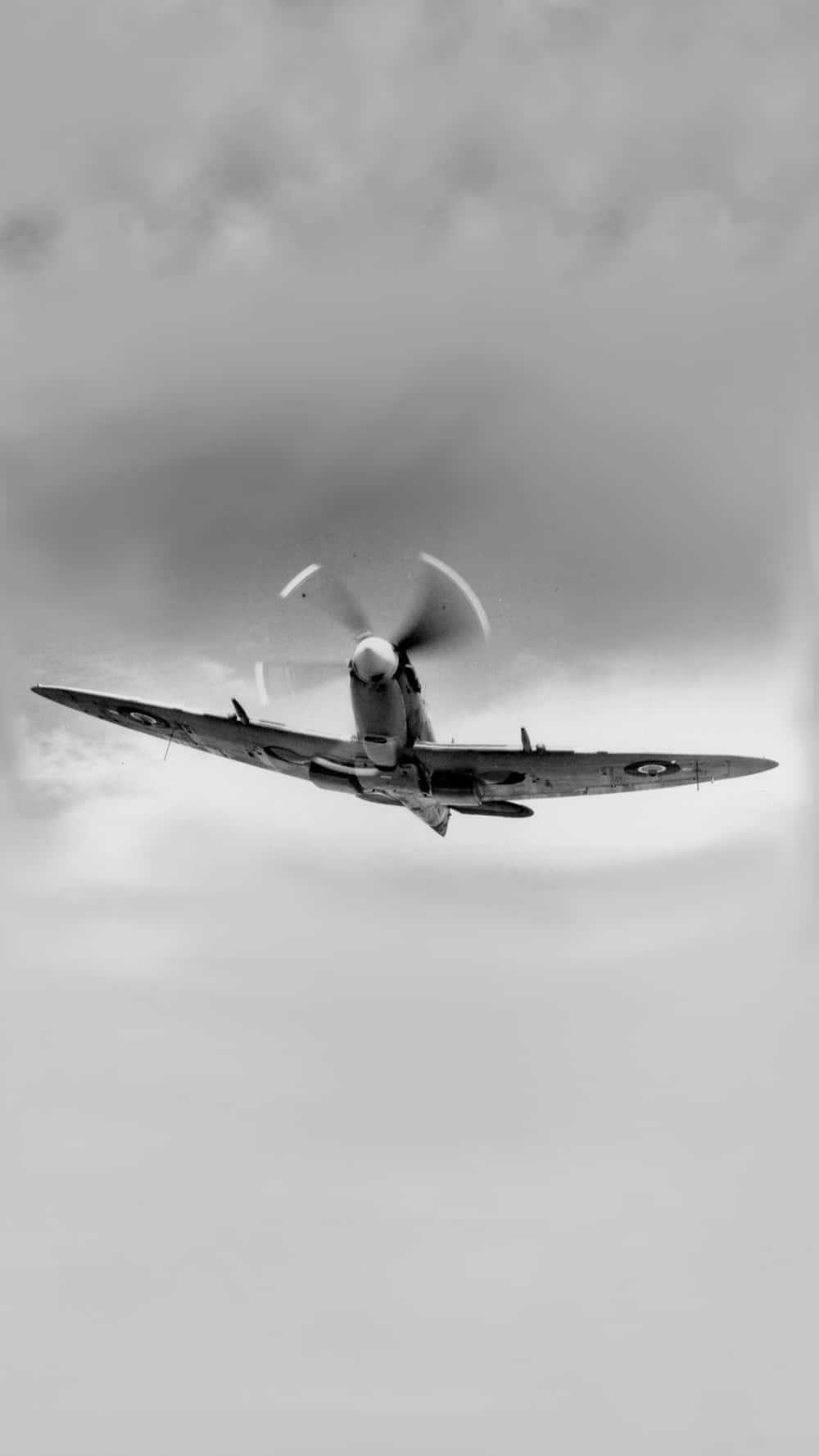 Propeller_ Aircraft_ Ascending_ Black_and_ White Wallpaper