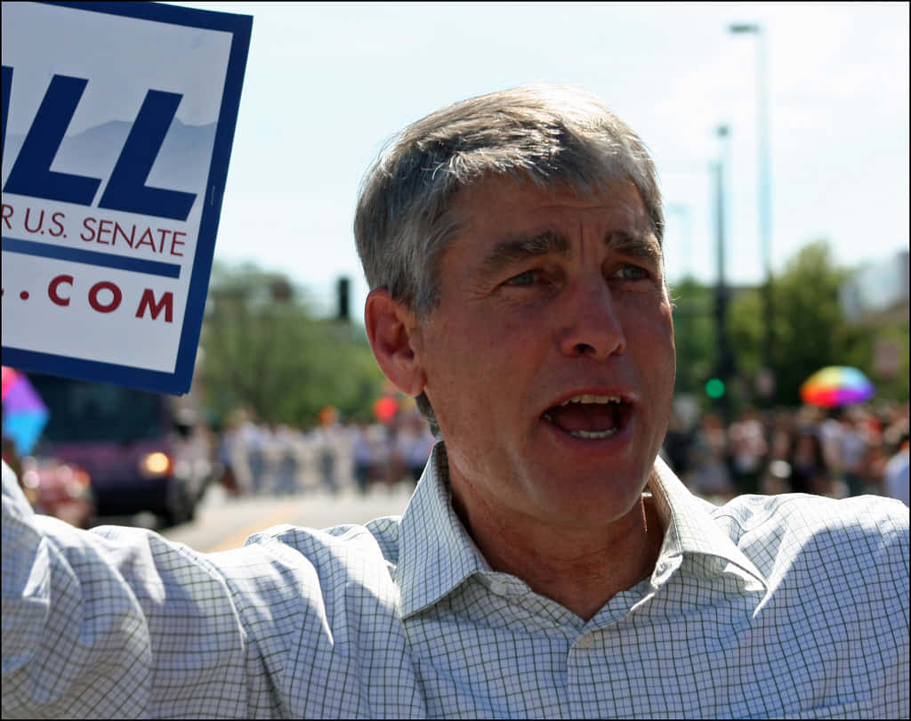 Download Protesting Mark Udall Wallpaper | Wallpapers.com