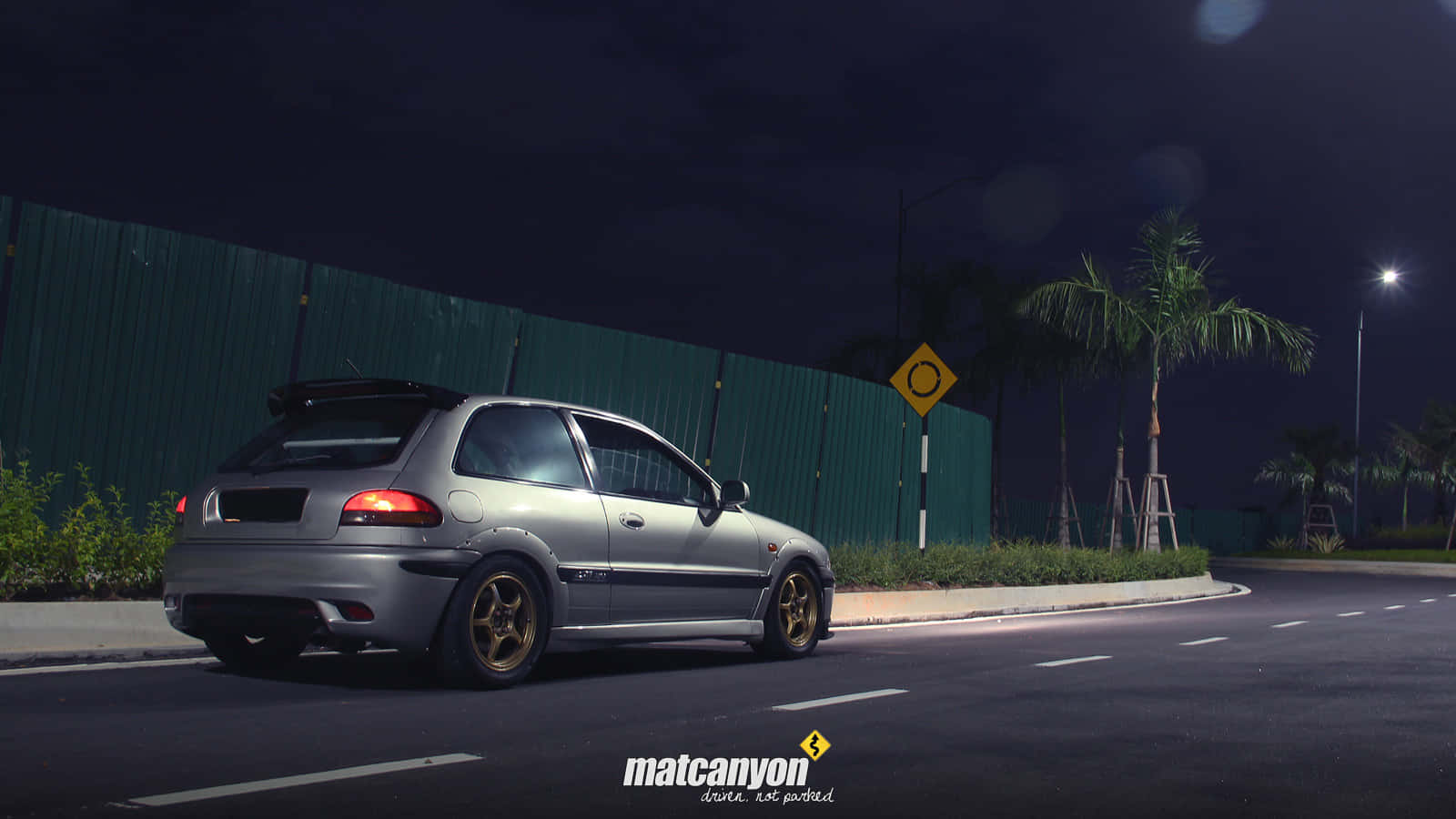 Stunning Proton Car in Action Wallpaper