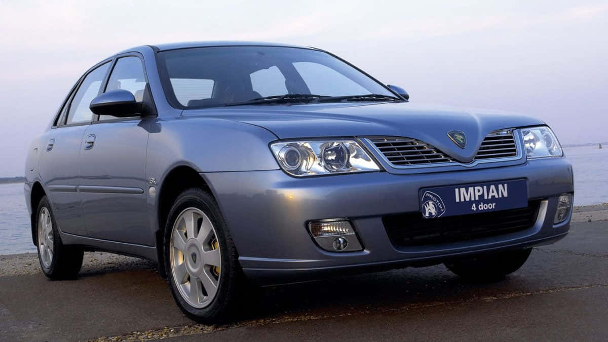 Proton Impian Sedan Bij De Waterkant Achtergrond