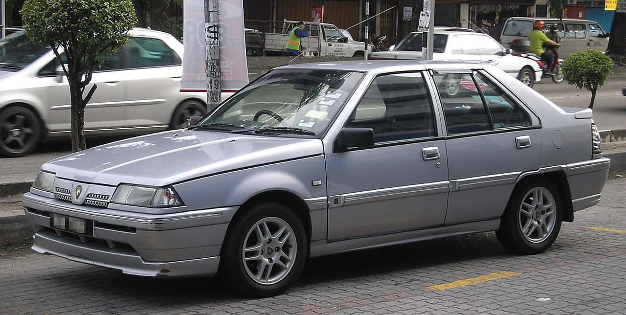 Proton Saga Klassisk Sedan Parkert Bakgrunnsbildet