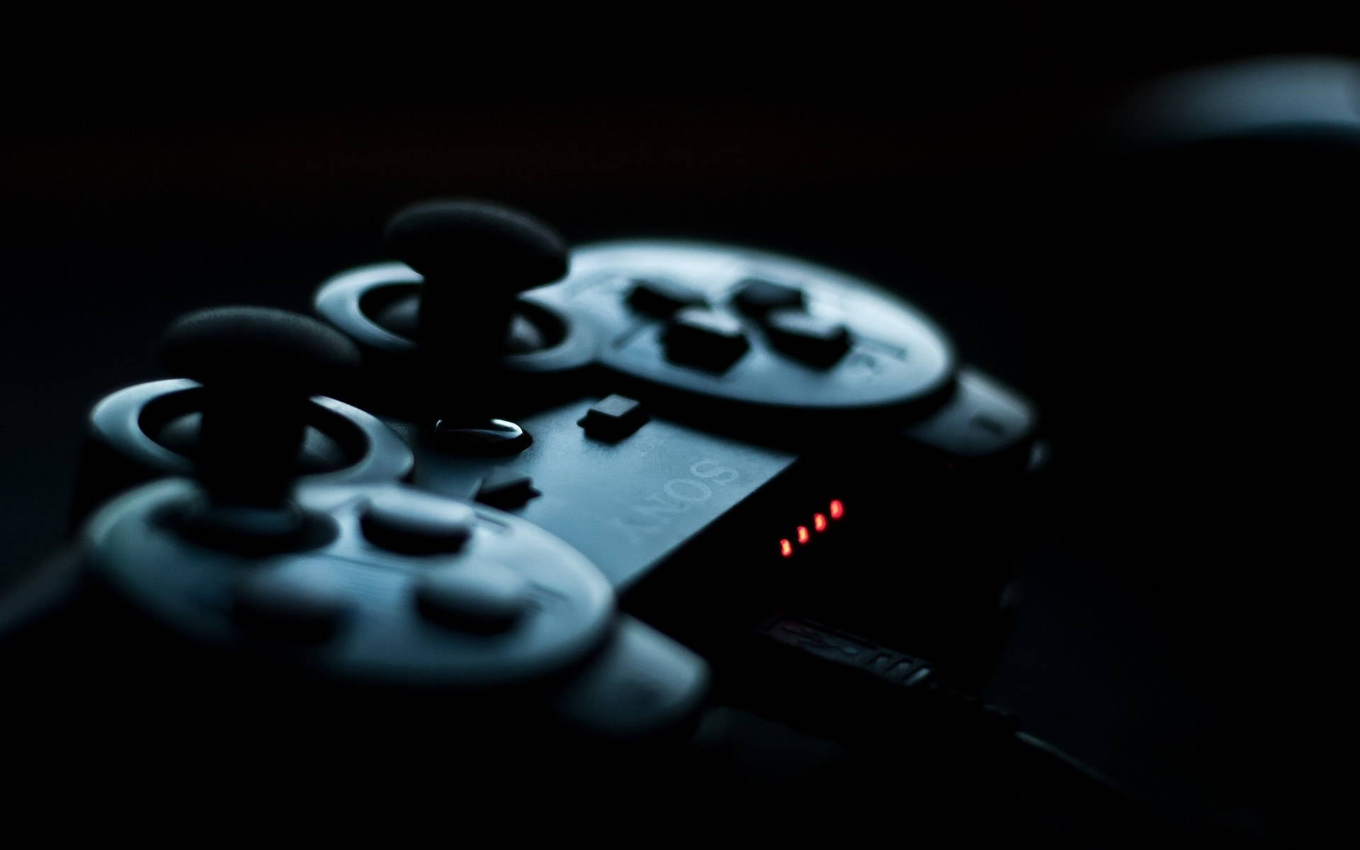 PS4 controller close-up photography wallpaper.