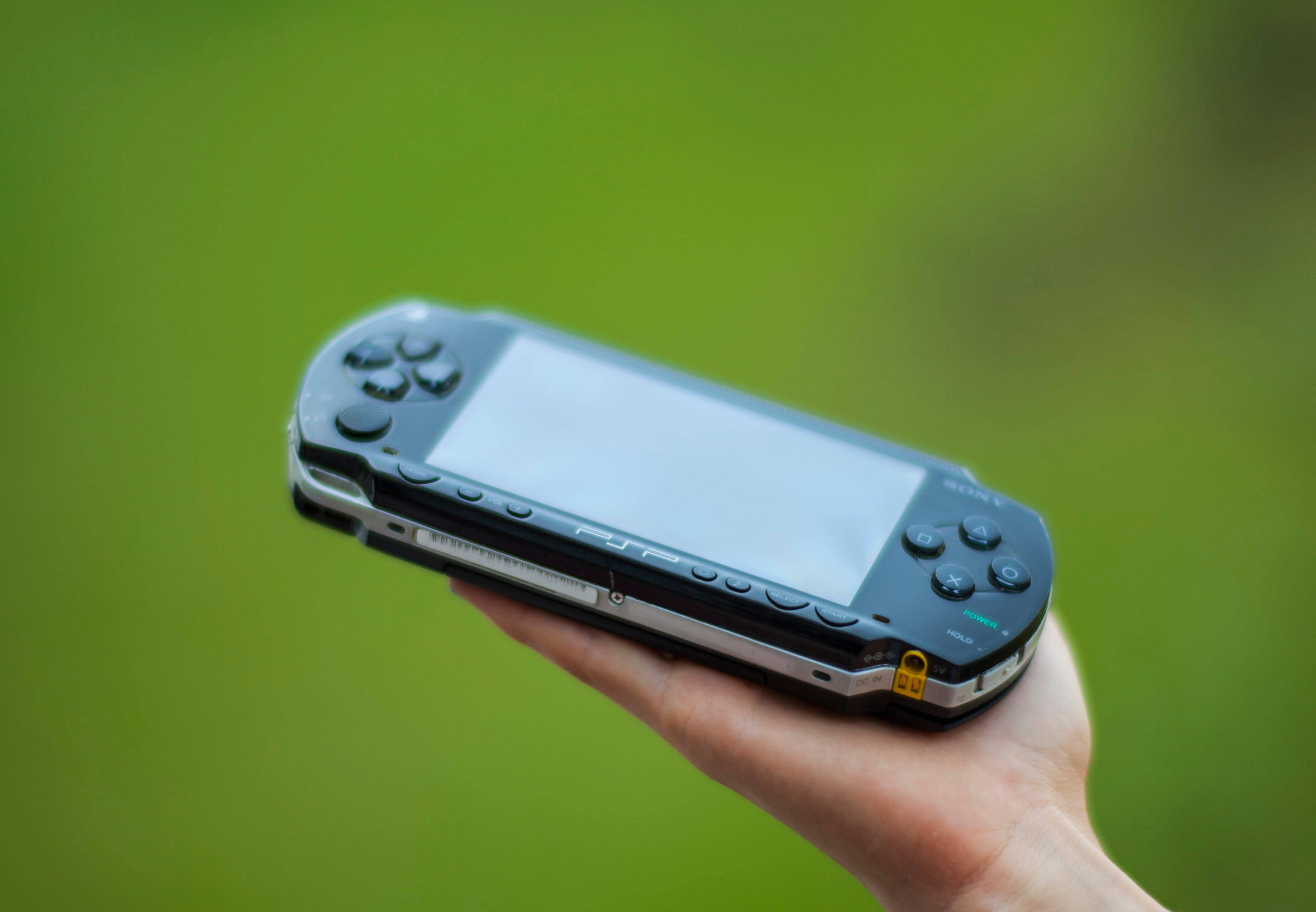 Psp On Someone's Hand Wallpaper