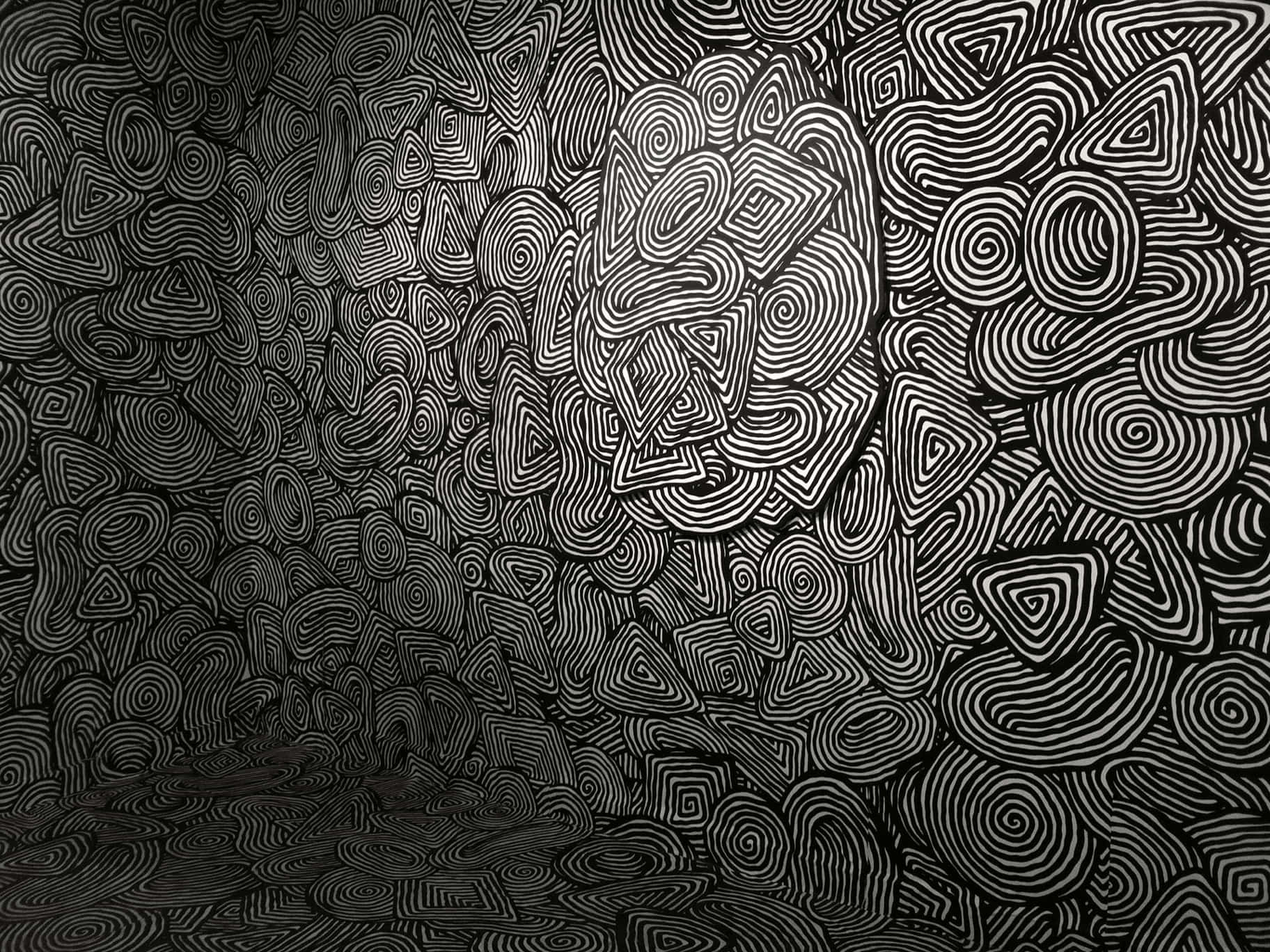A Room With Black And White Swirls On The Wall