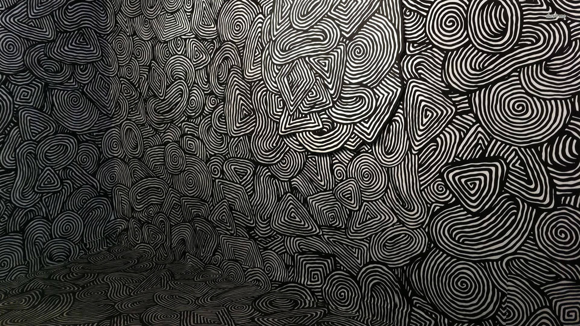 Black and white irregular spiral pattern psychedelic art wallpaper.