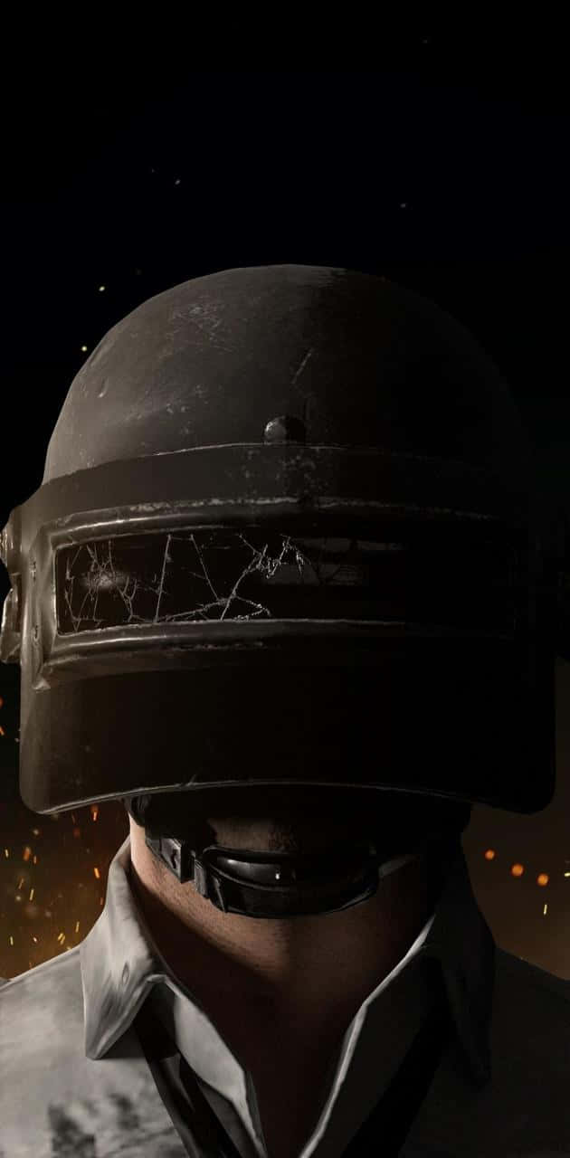 A Man In A Helmet With A Gun Wallpaper
