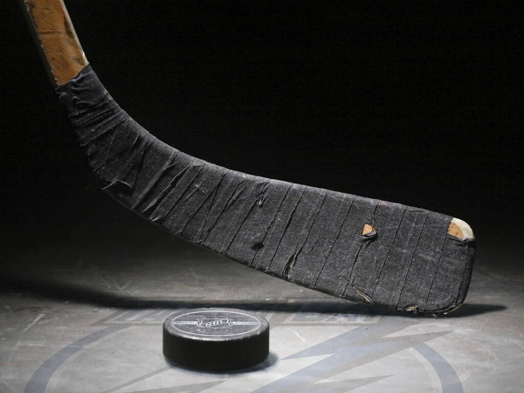 Puck With Stick Ice Hockey Wallpaper