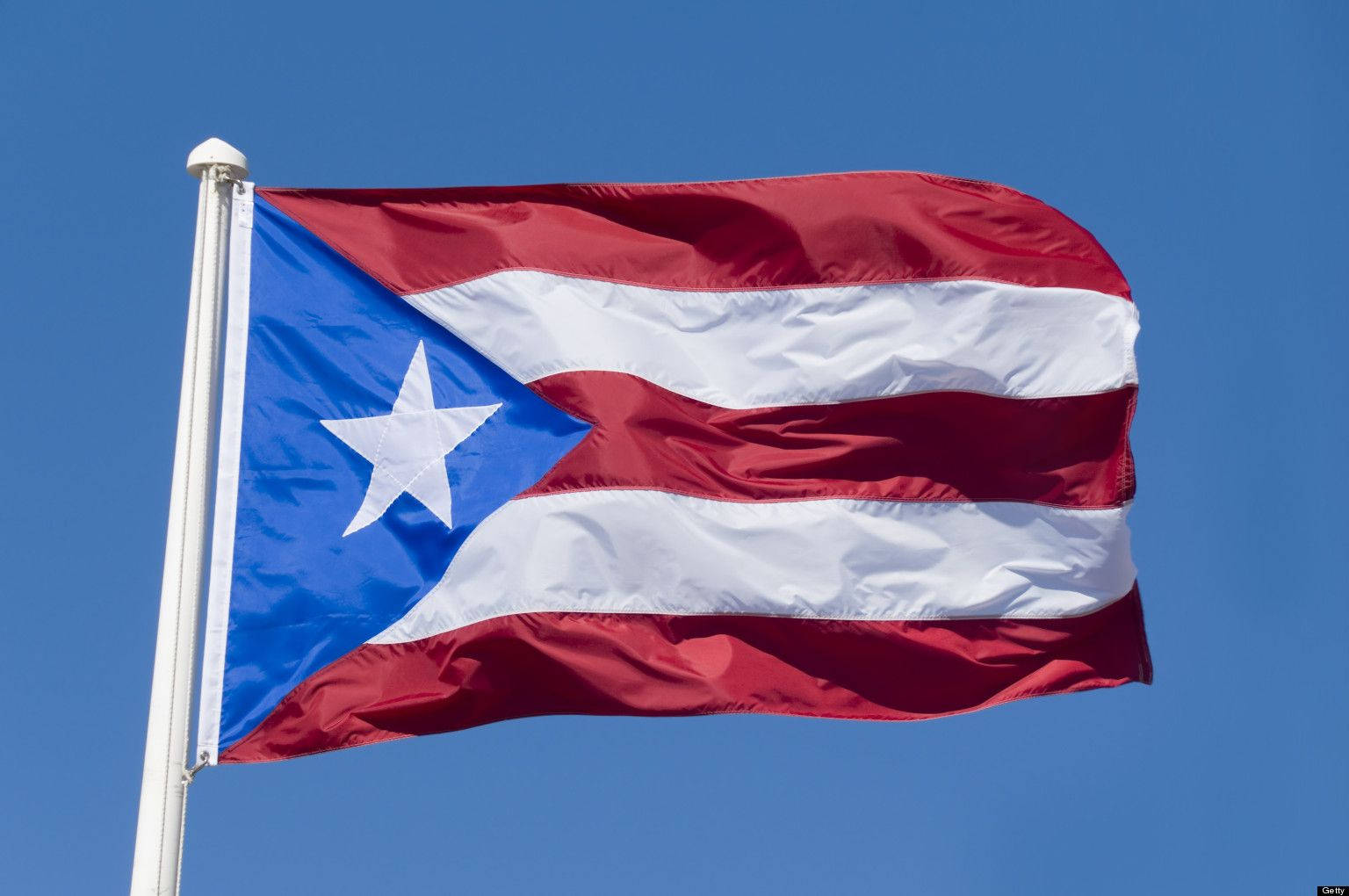 Puerto Rican Flag Up On Pole Wallpaper