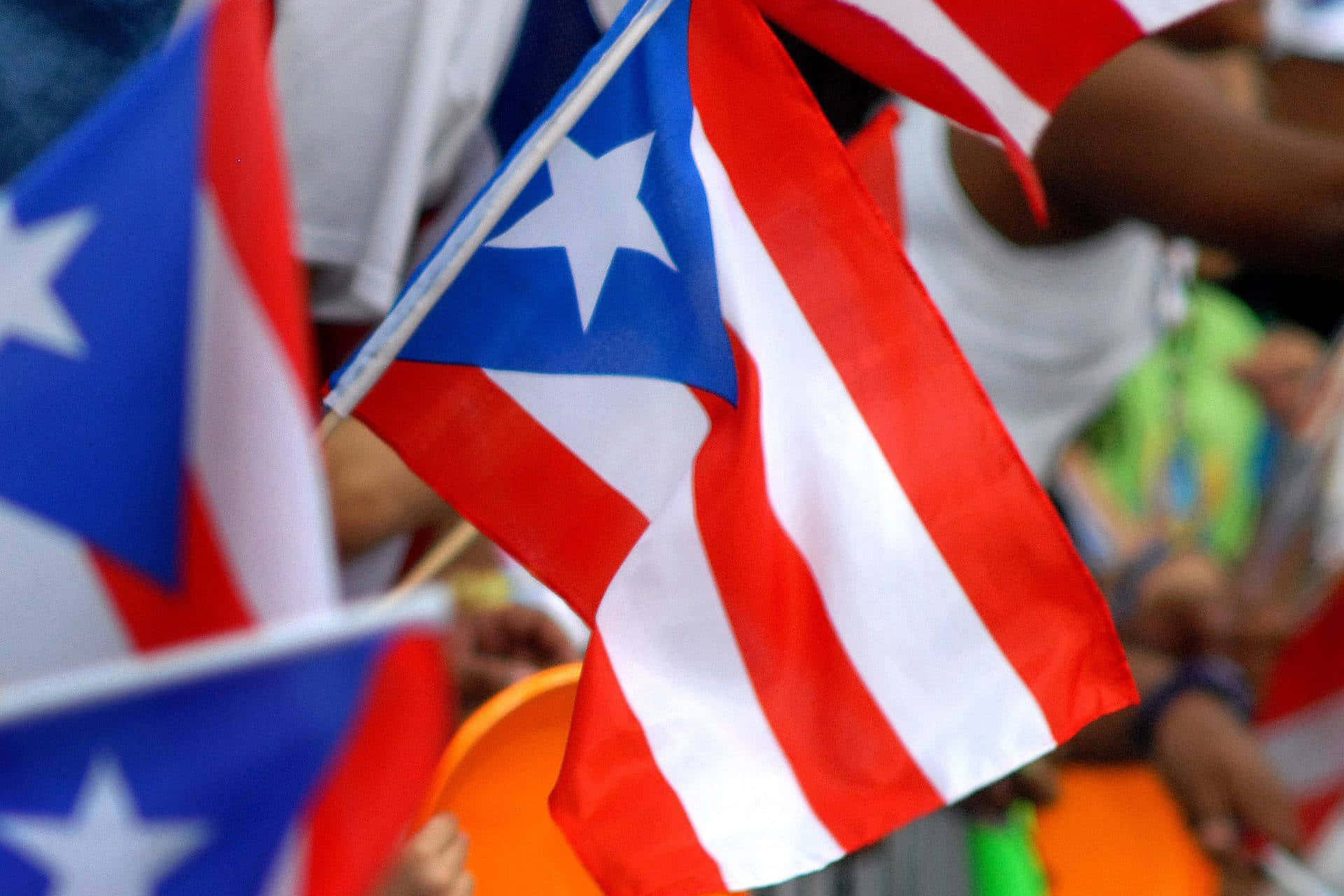 Download Puerto Rican Flags Celebration Wallpaper | Wallpapers.com