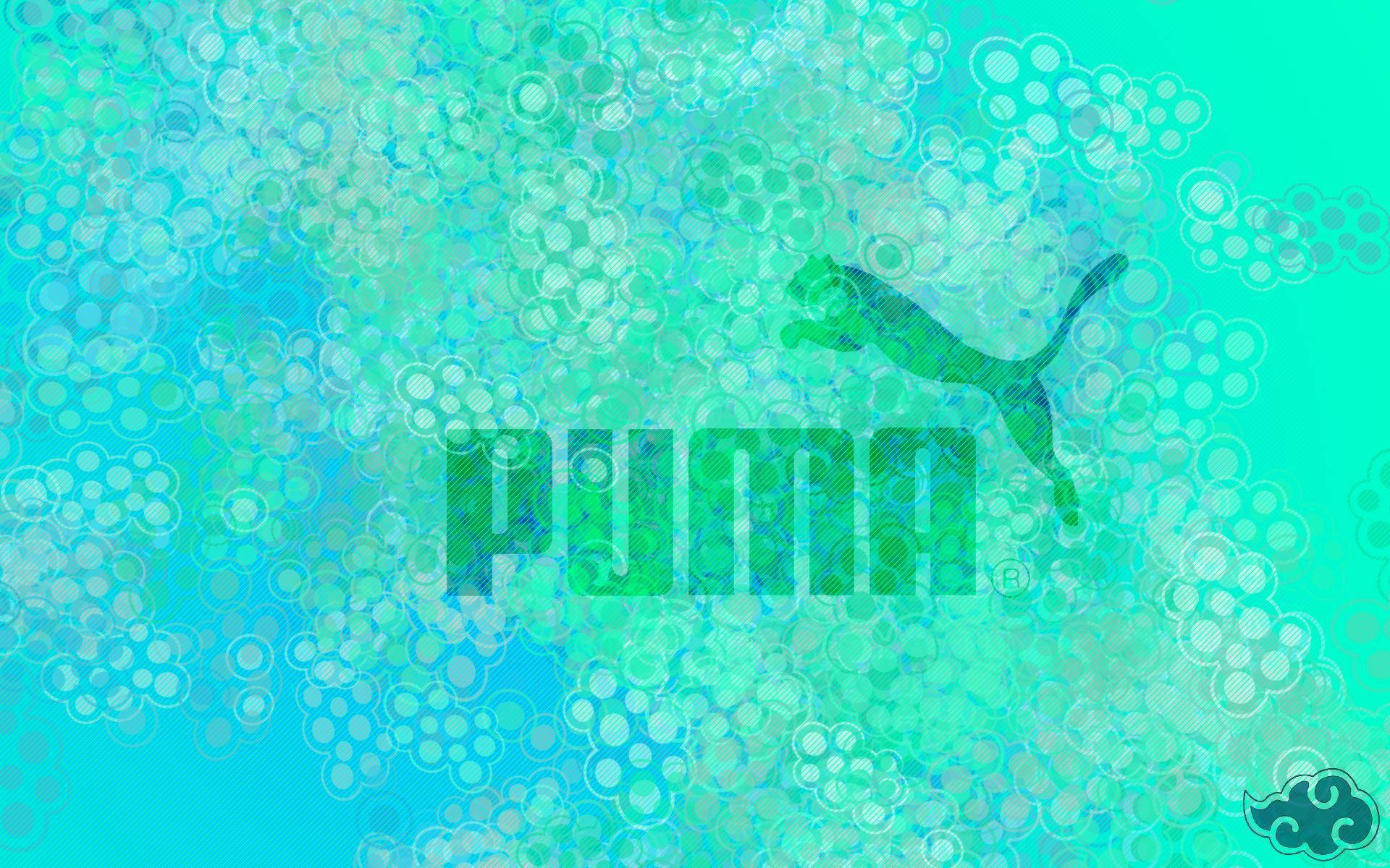 Puma i grønt Wallpaper