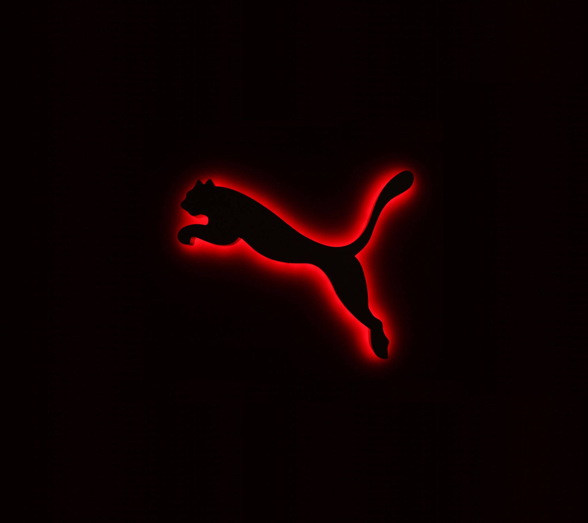 Logode Puma En Rojo Neón. Fondo de pantalla