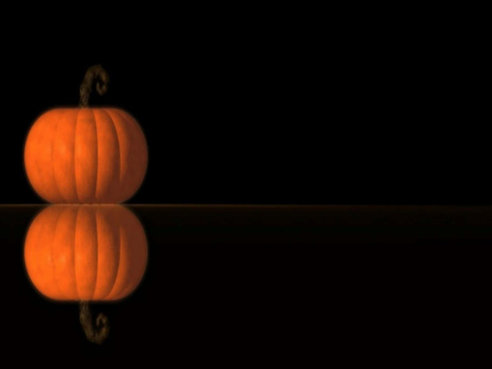Carved Pumpkin with Spooky Eyes Wallpaper