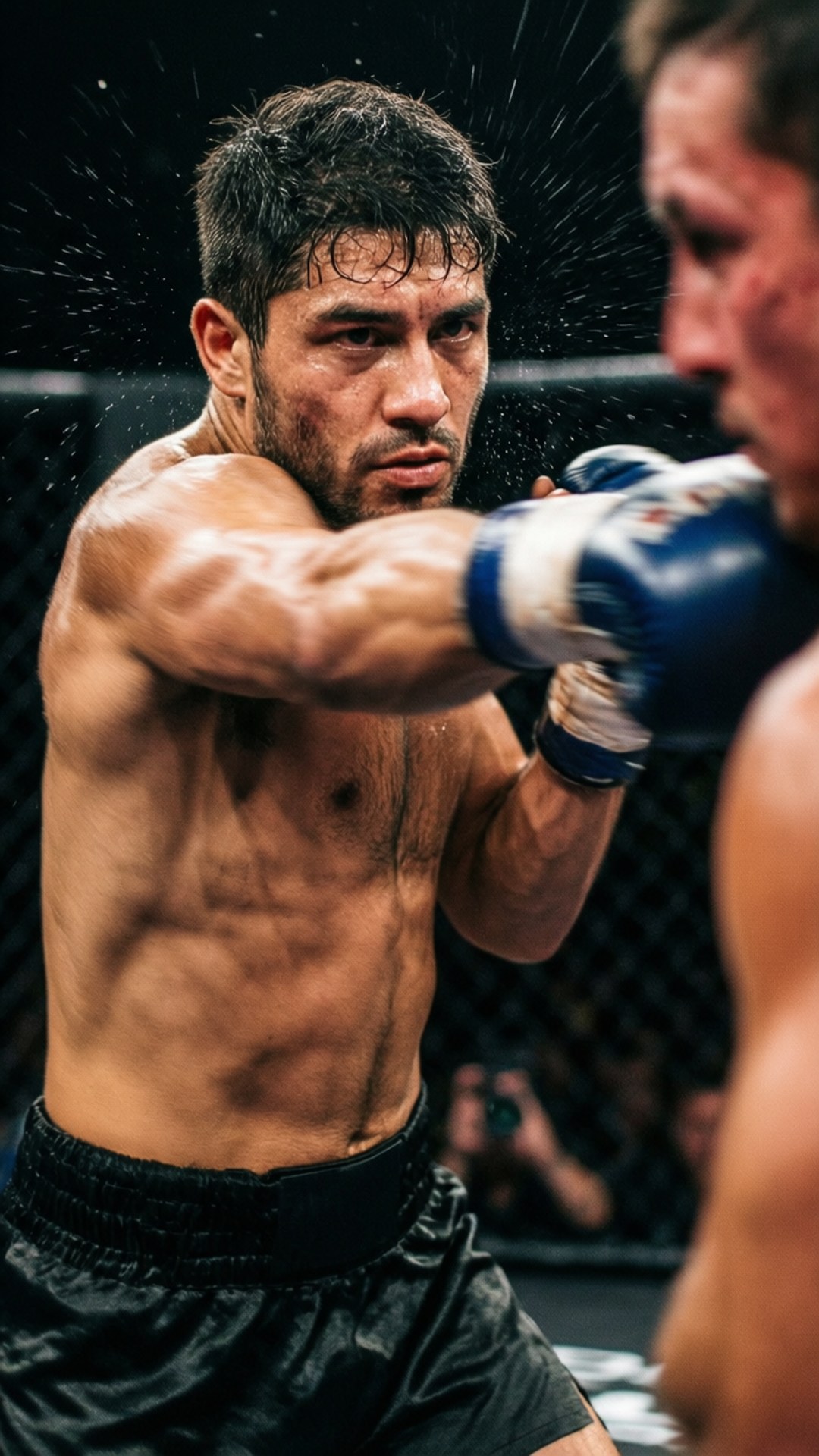 Athlete throwing a punch in a mixed martial arts cage fight.