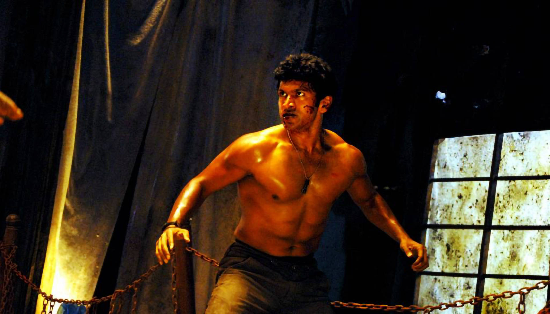 Puneeth Rajkumar Fighting In The Ring Wallpaper