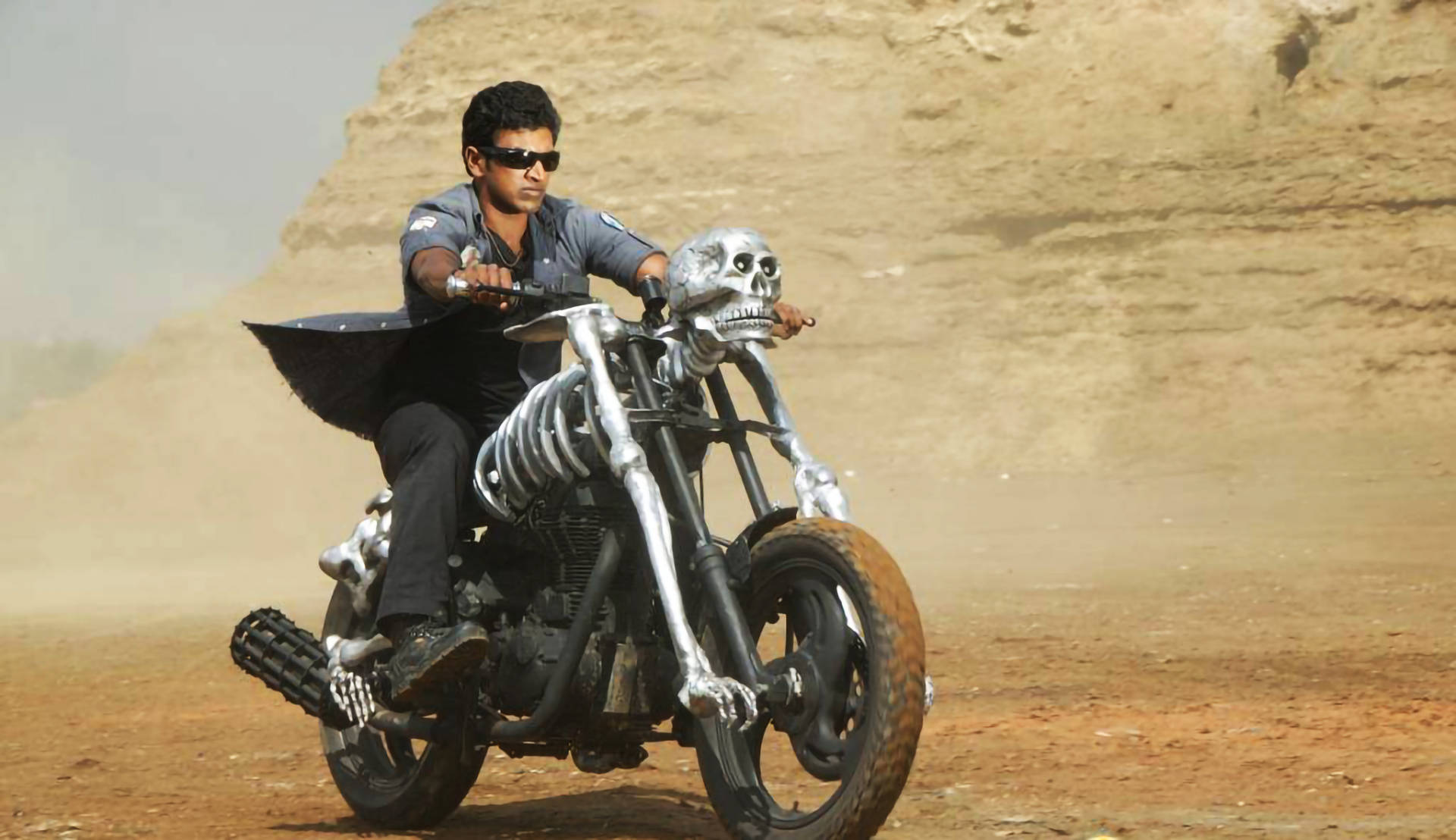Puneeth Rajkumar Skeleton Motorcycle Desert Wallpaper