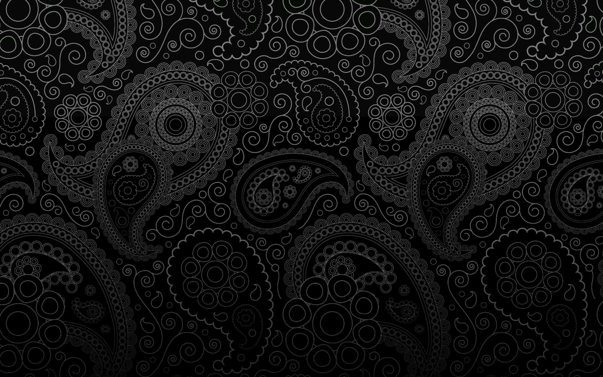 A Black Paisley Wallpaper With A Black Background