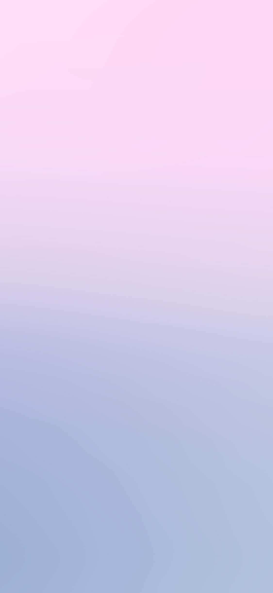 A dreamy, pastel sky filled with purple hues and pink blushes Wallpaper