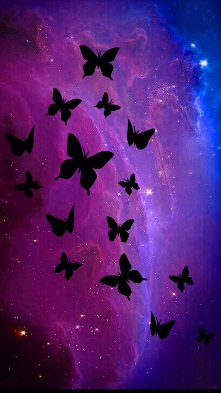 A Purple And Blue Background With Butterflies Flying In The Sky Wallpaper
