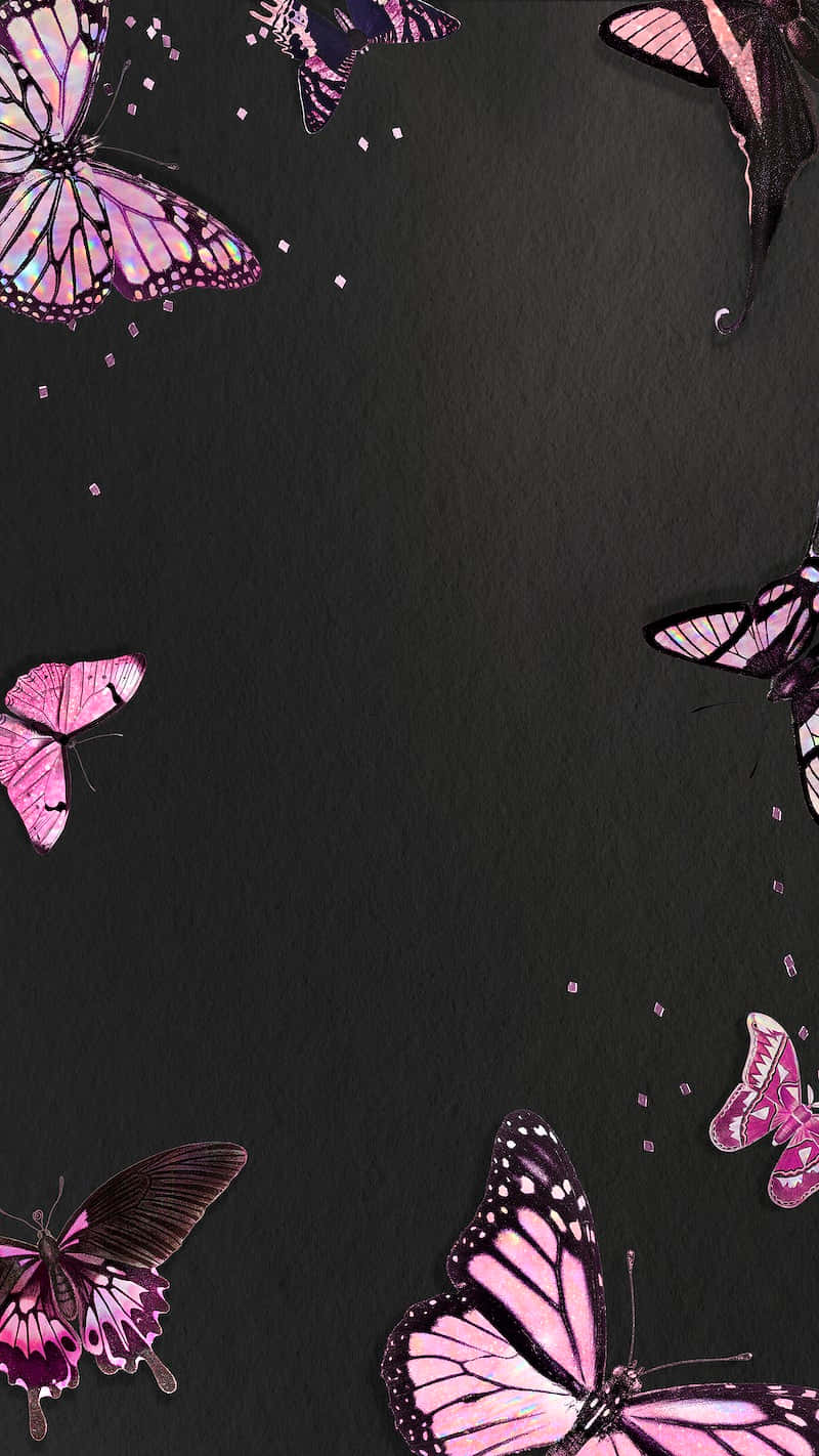 A Black Background With Pink Butterflies On It Wallpaper