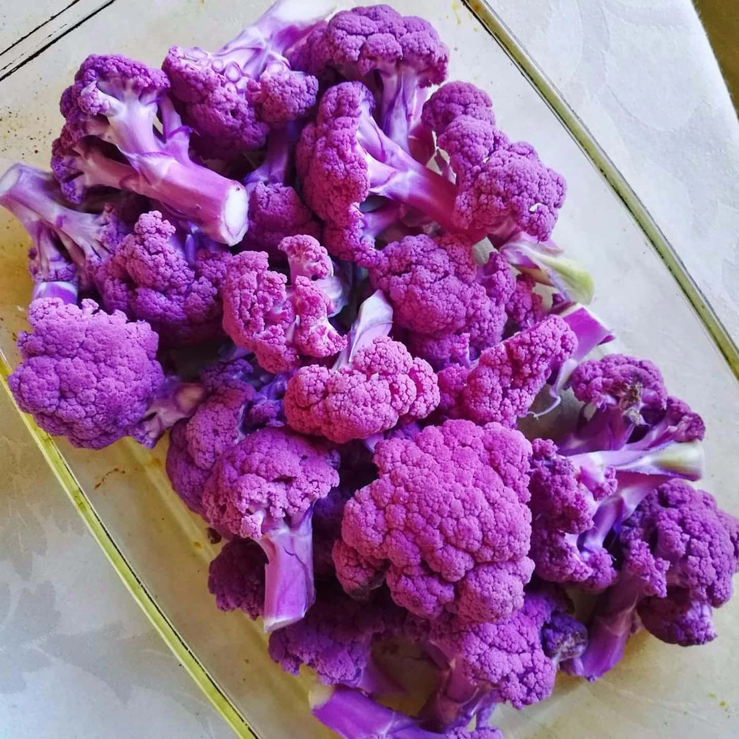 A delicious plate of vibrant purple cauliflower, perfect for a healthy balanced meal. Wallpaper