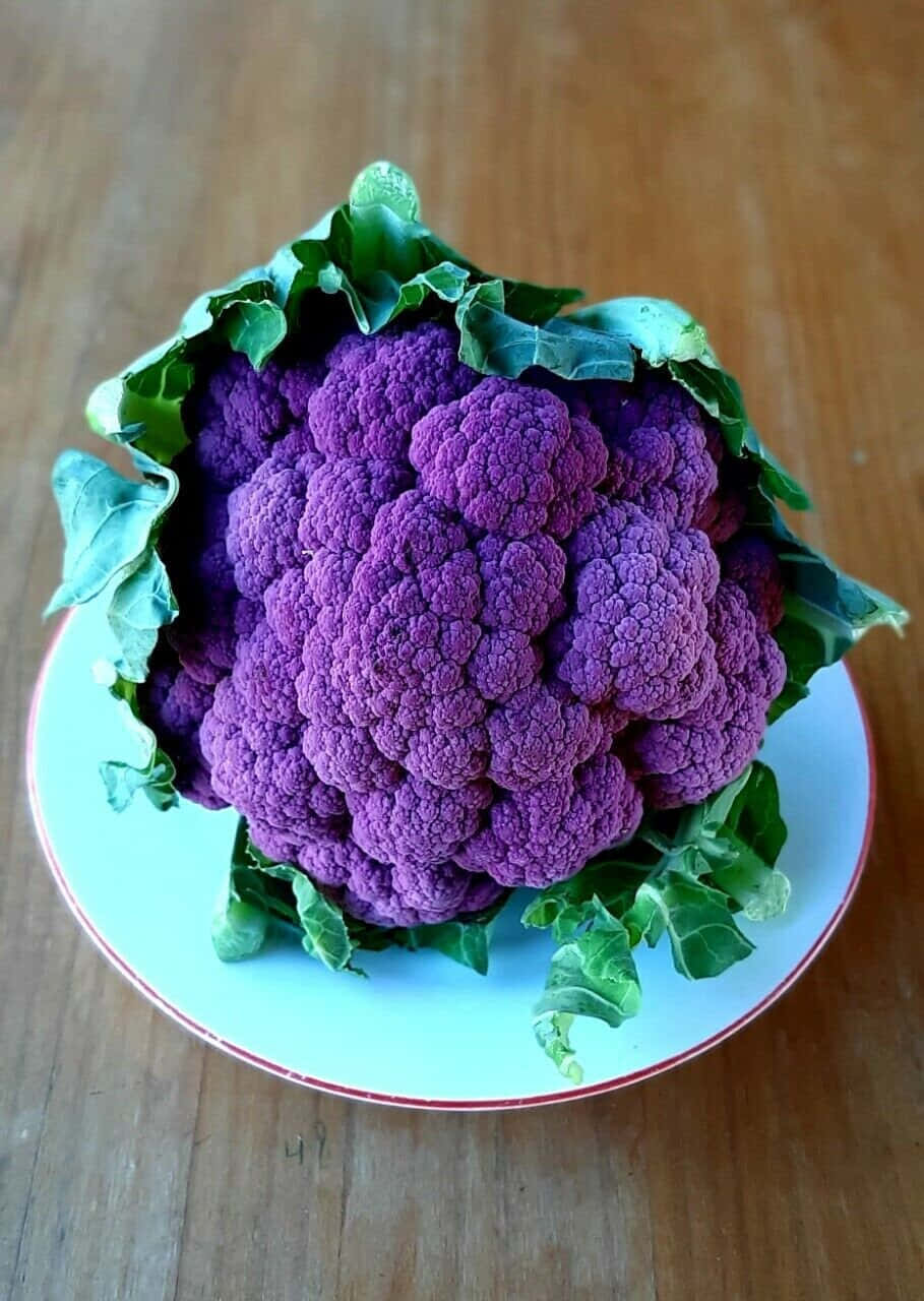 Enjoy a delightful handful of purple cauliflower Wallpaper