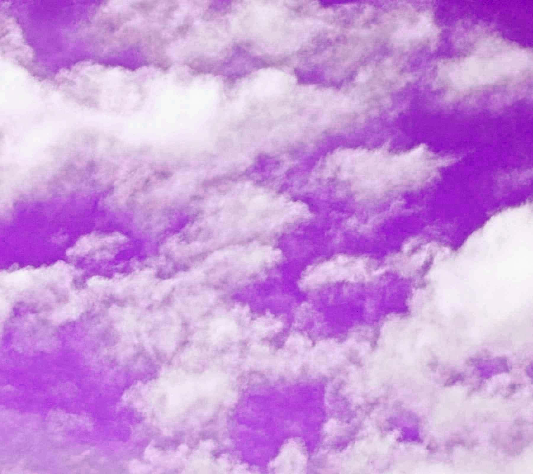 Caption: Dreamy Purple Clouds Background