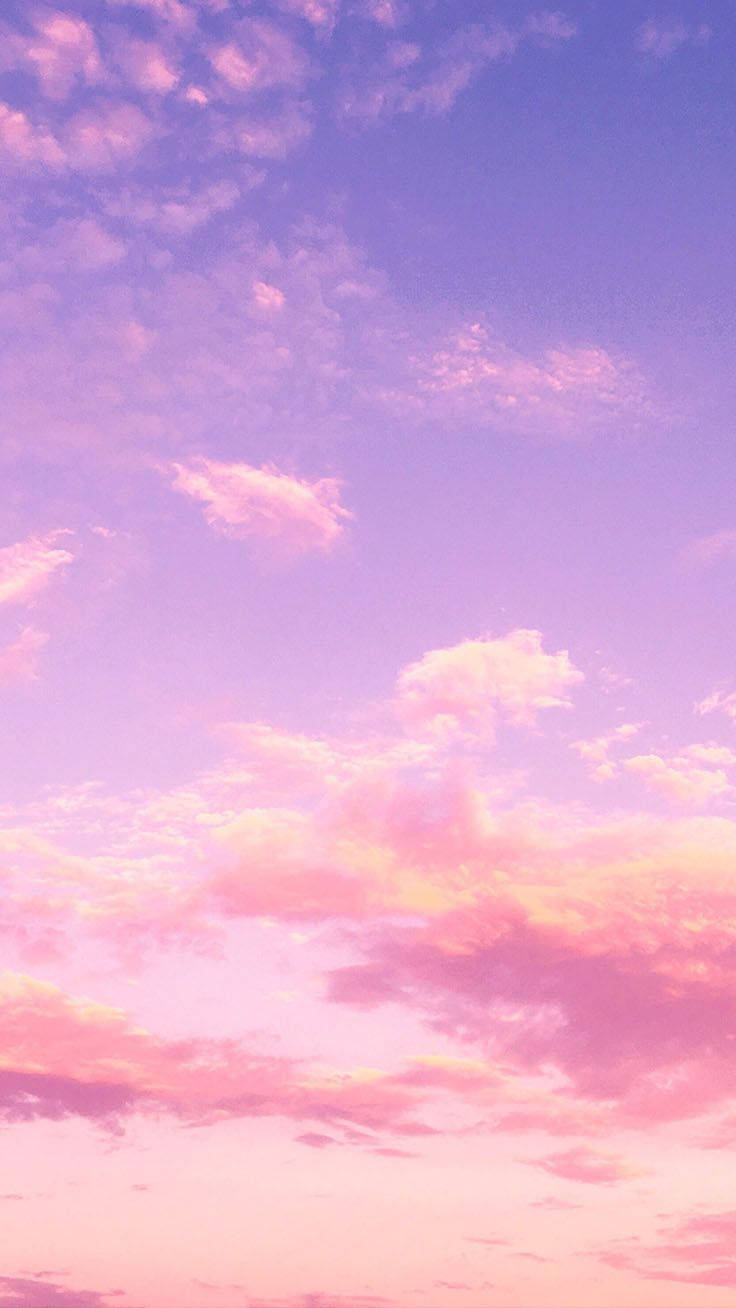 "Welcome the Calm of Early Mornings with a Vast Stretch of Purple Clouds" Wallpaper
