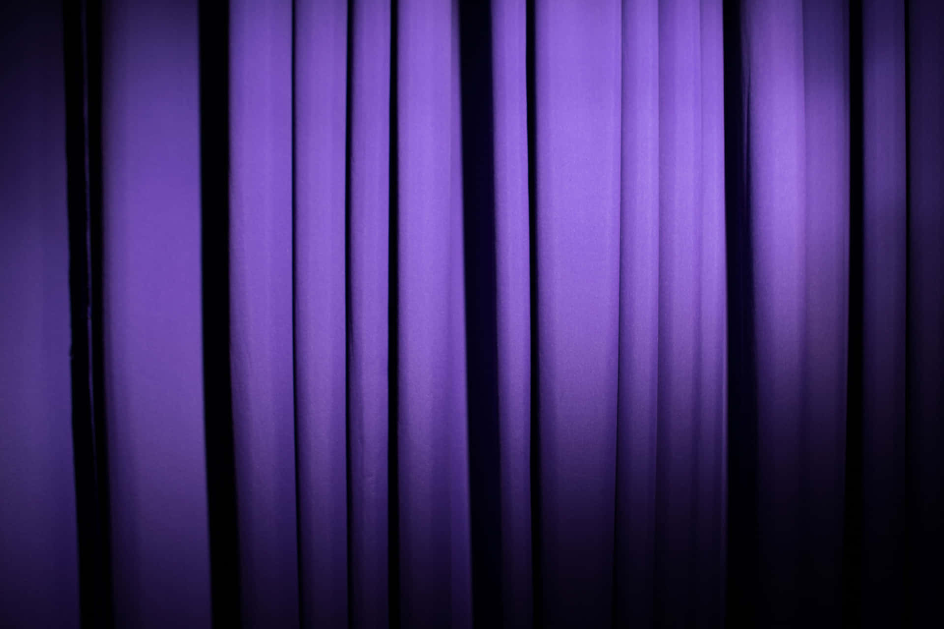 Add a touch of luxury to any space with vibrant, purple curtains Wallpaper