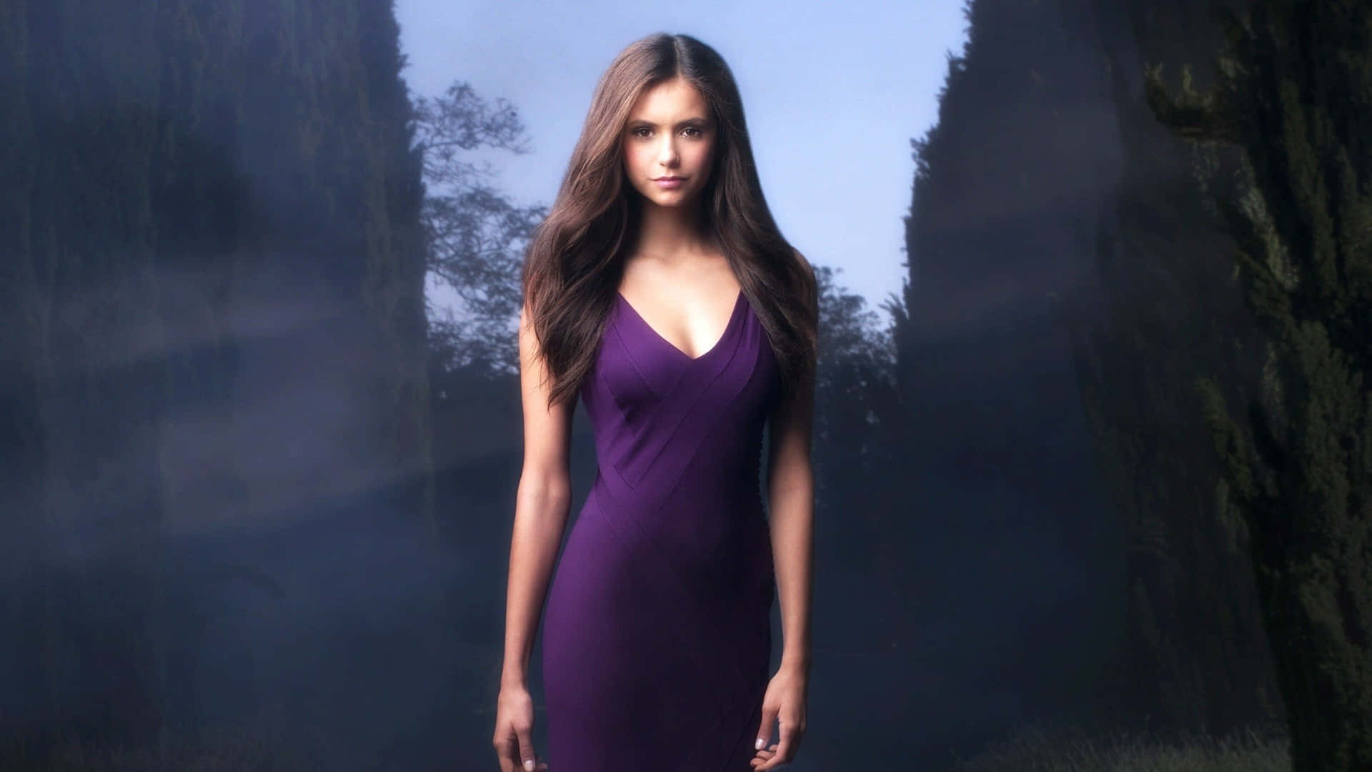 Feel luxurious this season in this beautiful rich purple dress Wallpaper