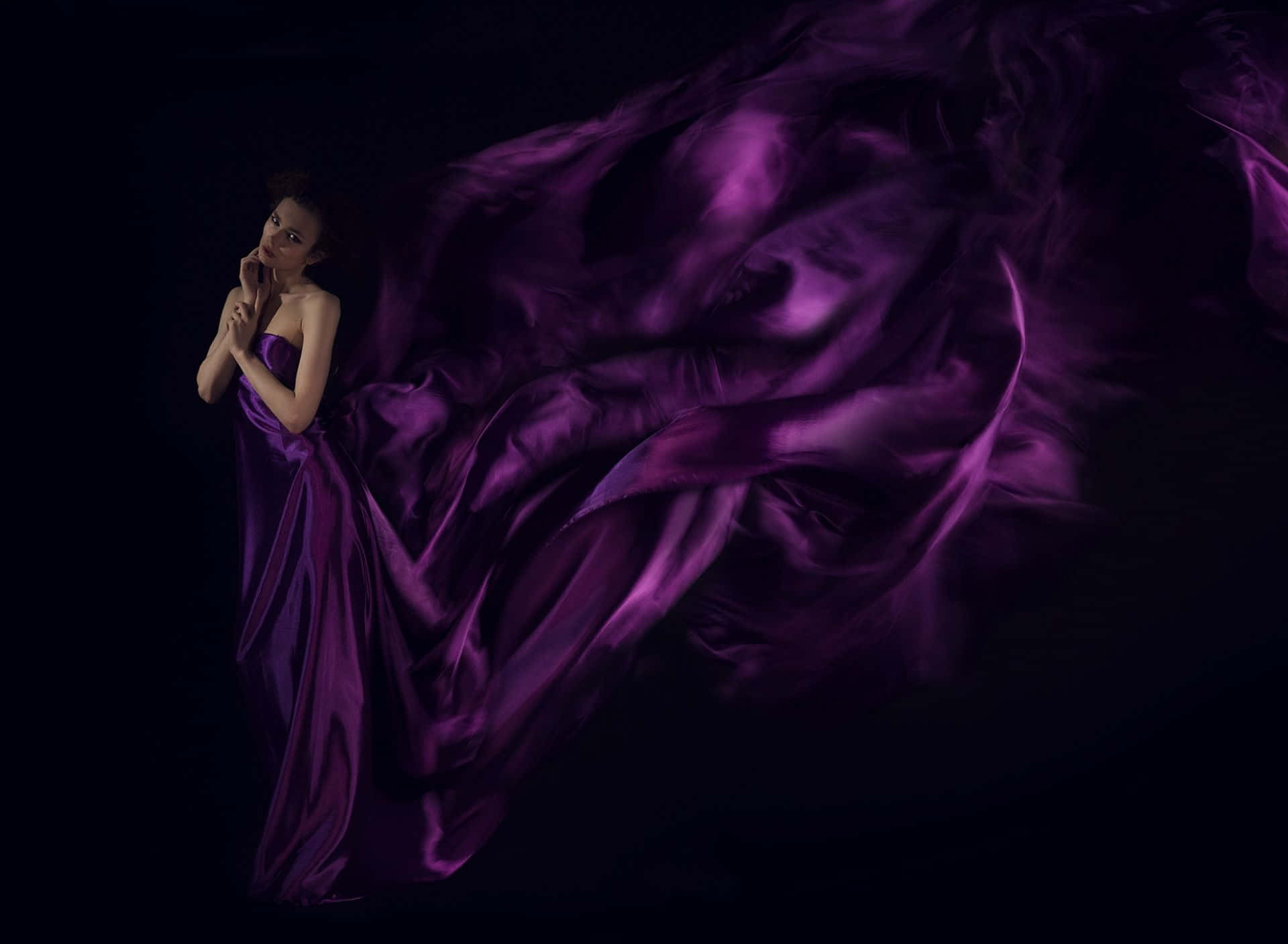 Look Radiant in a Stunning Purple Dress Wallpaper