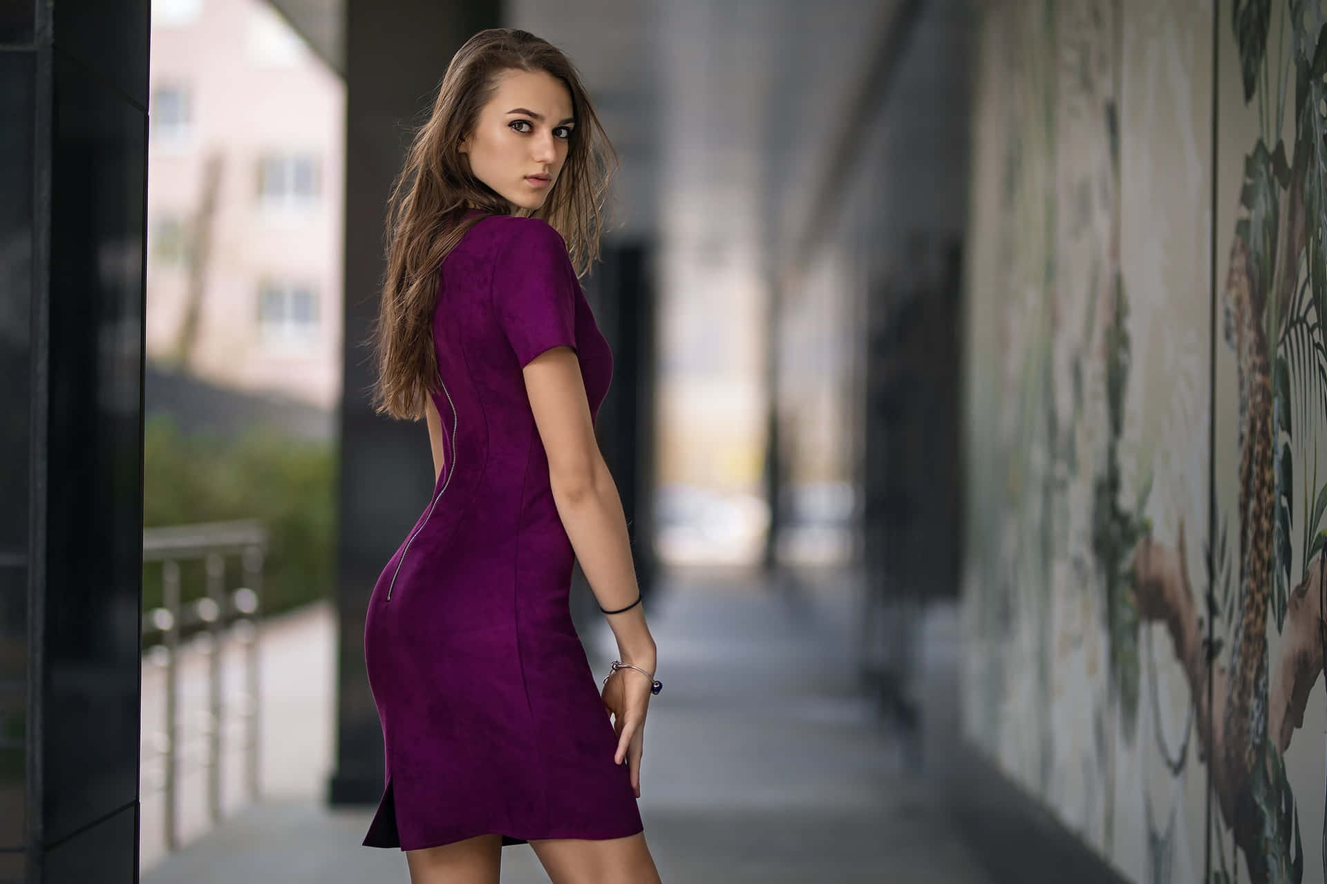 Add a splash of color to your wardrobe with this flattering purple dress. Wallpaper