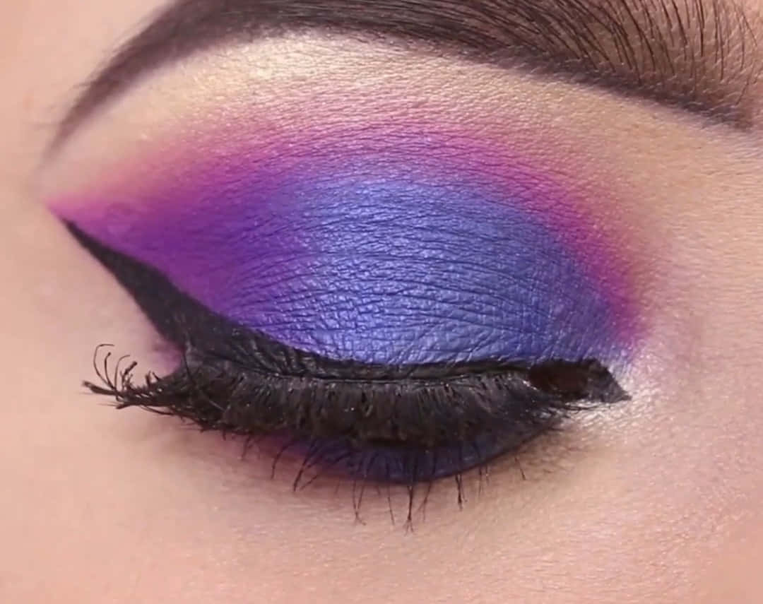 Add a Pop of Color with This Trendy Purple Eye Shadow! Wallpaper