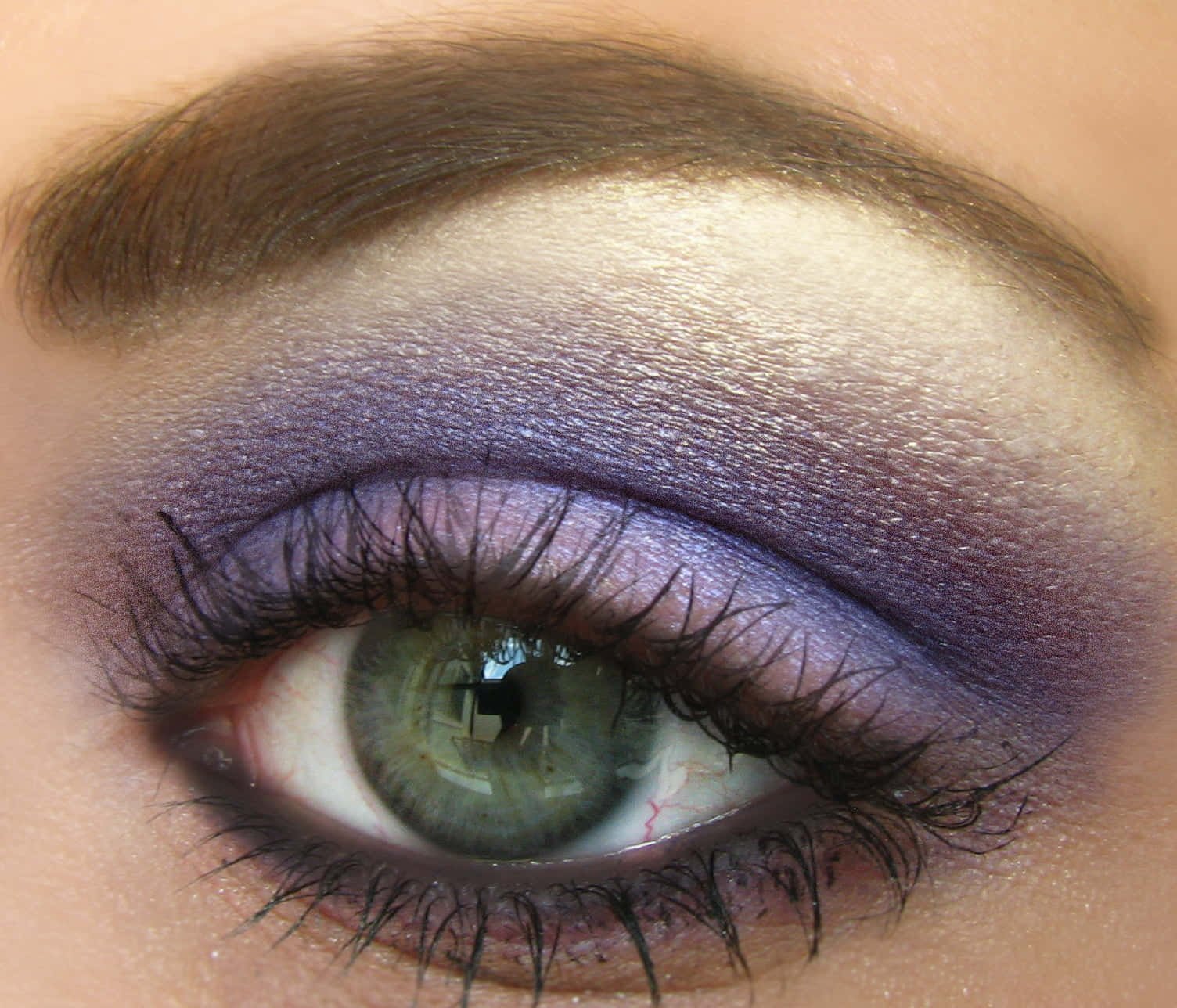 Make your eyes stand out with bold purple eye shadow. Wallpaper