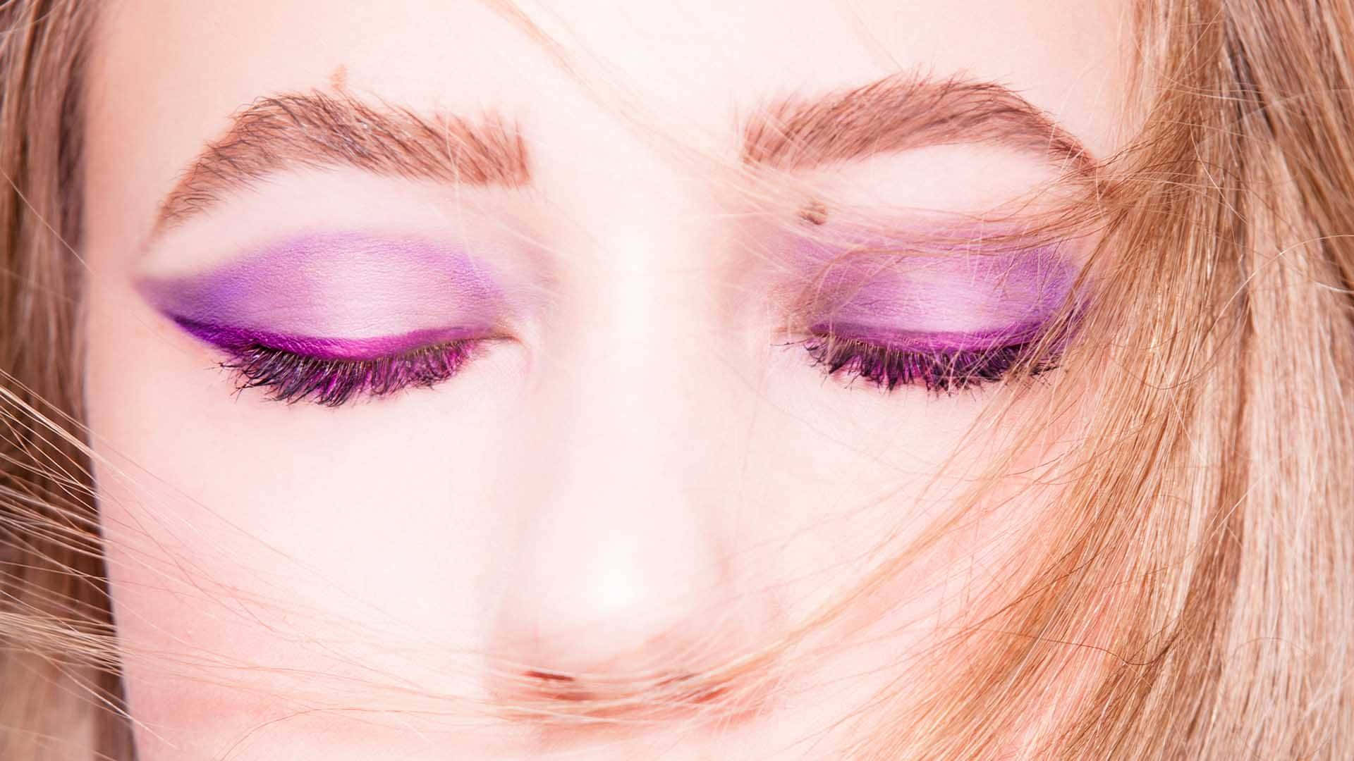 Enhance Your Look with Purple Eye Shadow Wallpaper