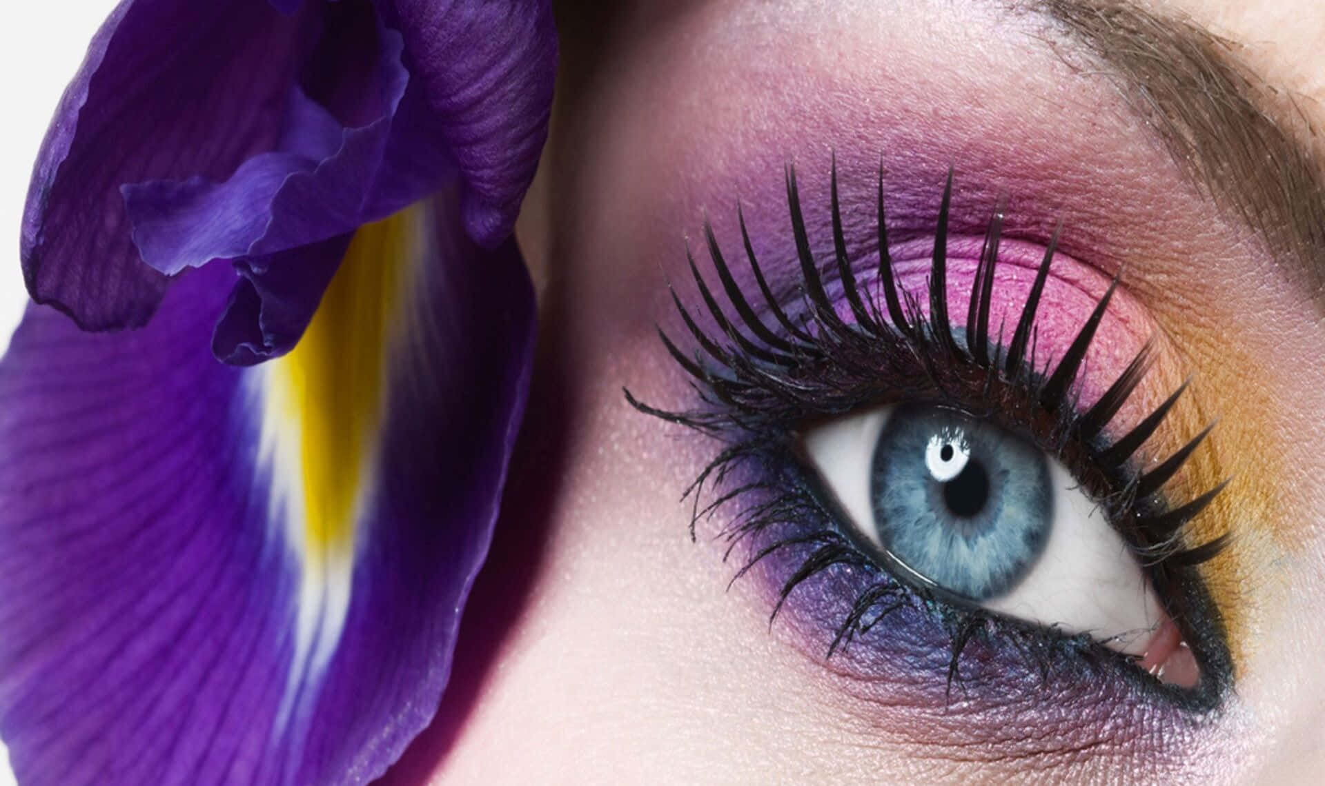 Perfectly Applying Purple Eye Shadow to Achieve a Magical Look Wallpaper