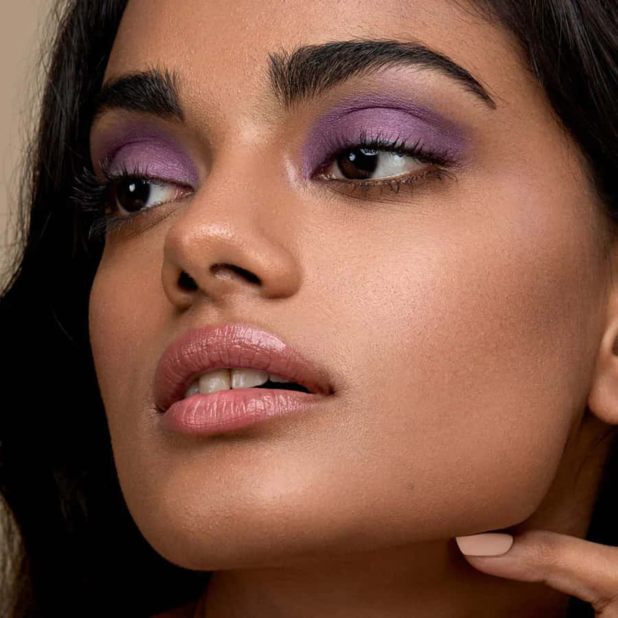 Look stunning with statement purple eye shadow Wallpaper