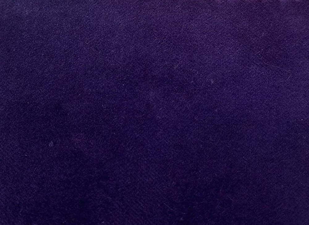 Explore magnificent patterns in luxurious purple fabrics Wallpaper