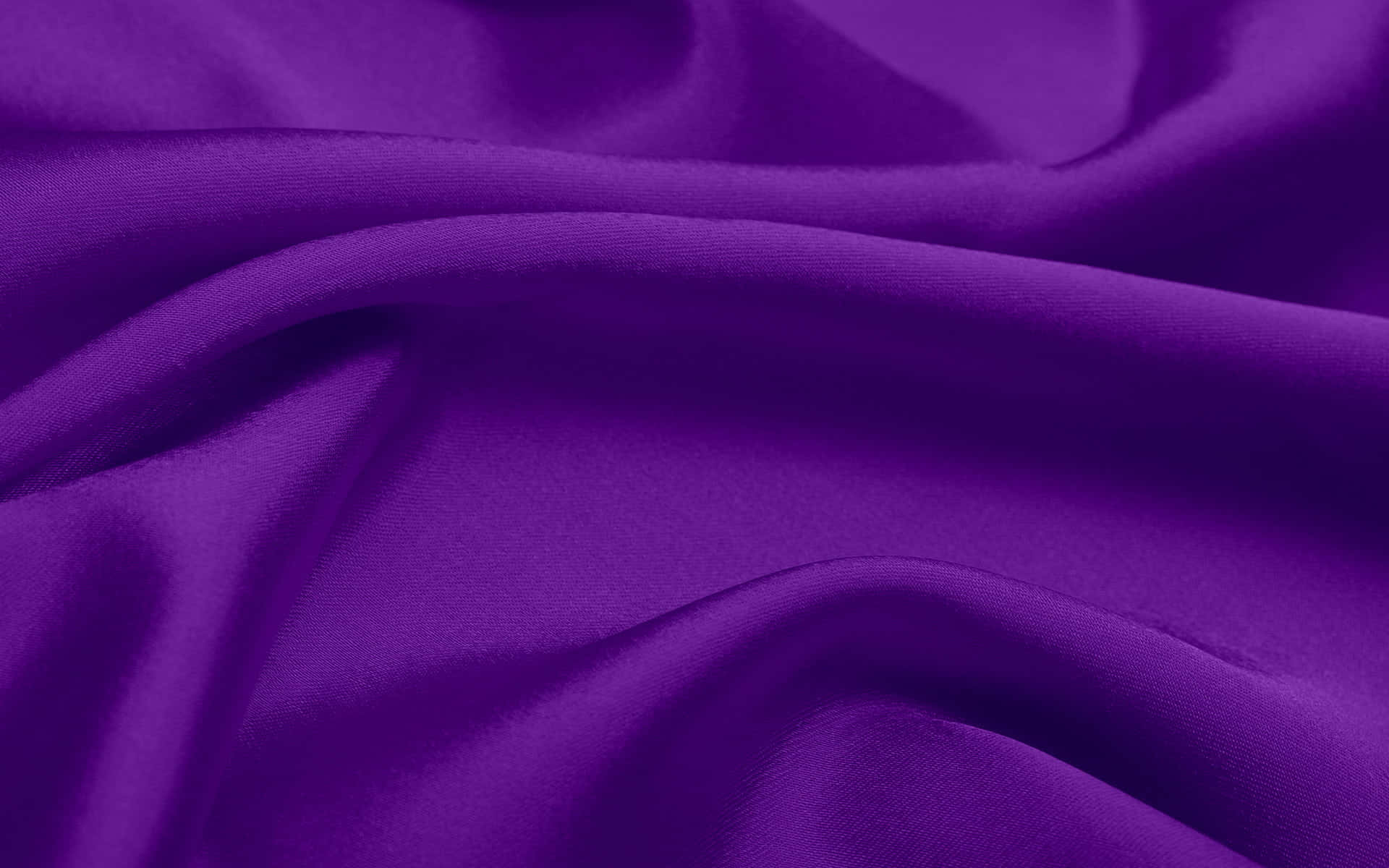 Experience the luxury of Purple Fabrics Wallpaper