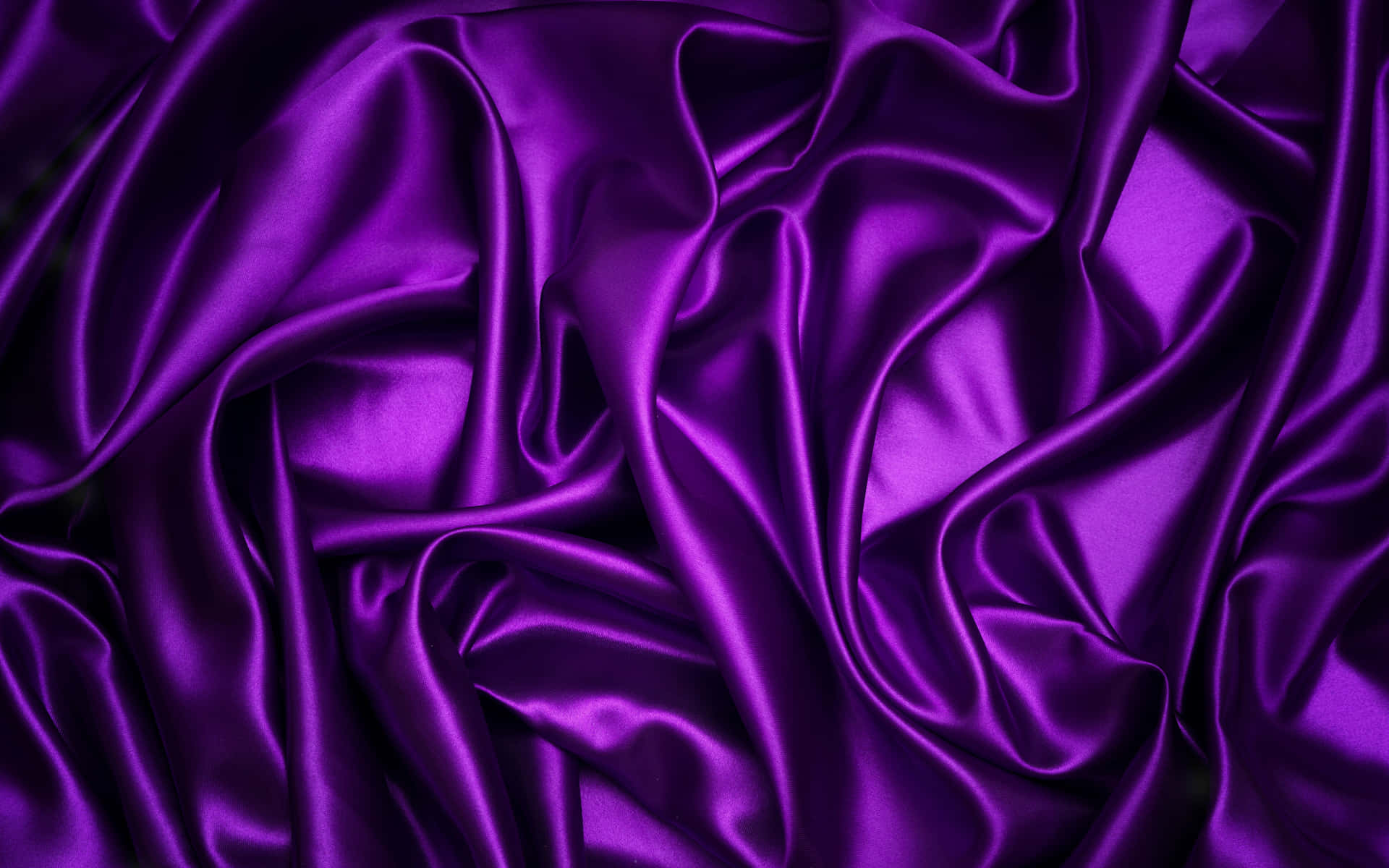Explore the world of luxury with Purple Fabrics Wallpaper
