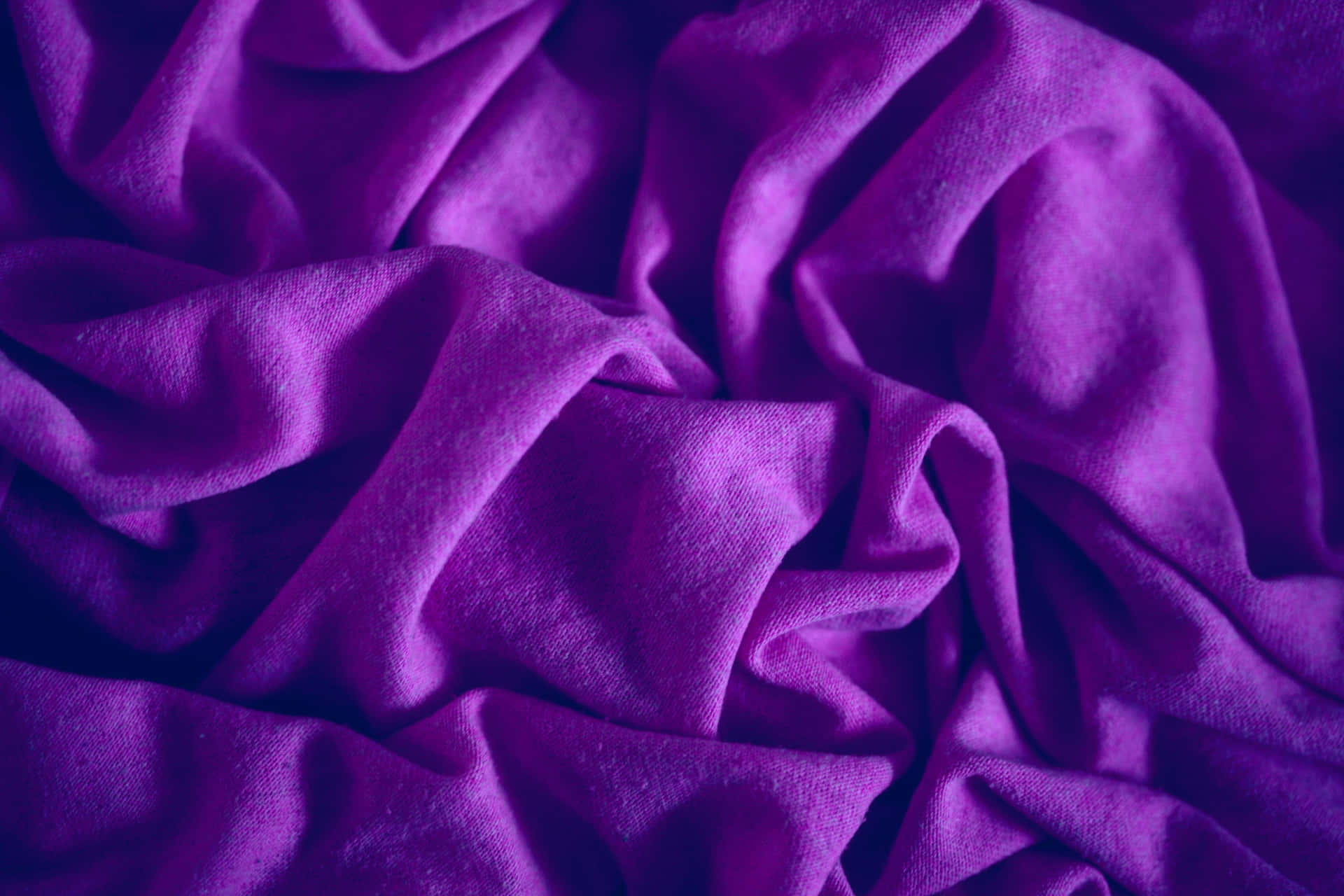 Add a Splash of Color to Your Home Decor with Purple Fabrics Wallpaper