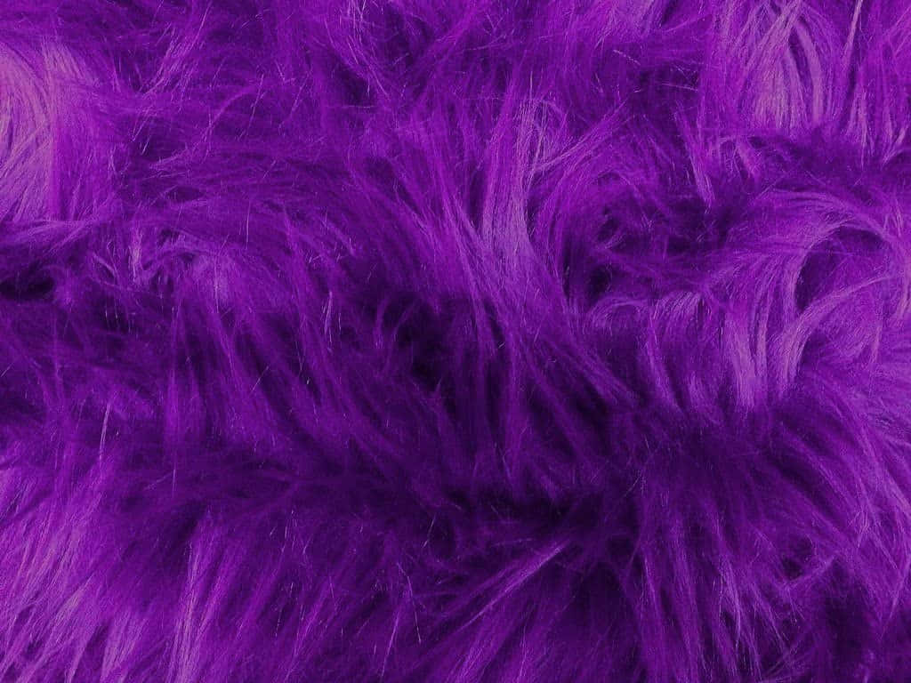 Experience Luxurious Comfort with our Purple Faux Fur Wallpaper