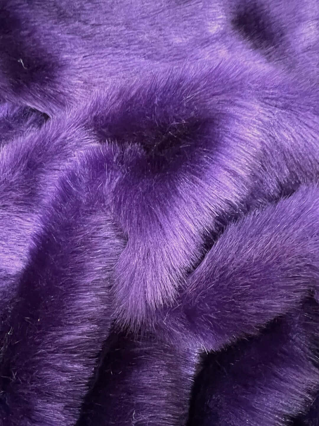 Add a Touch of Style and Sophistication to Your Home with Purple Faux Fur Wallpaper