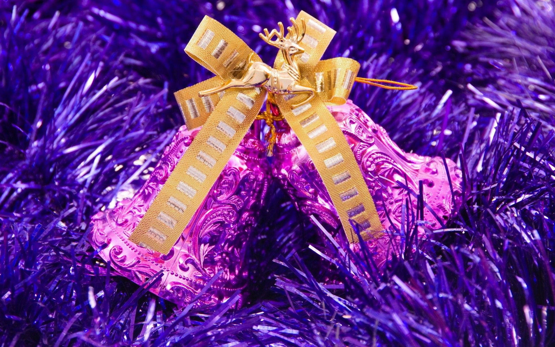 Purple Festive Bells With Gold Ribbon Wallpaper