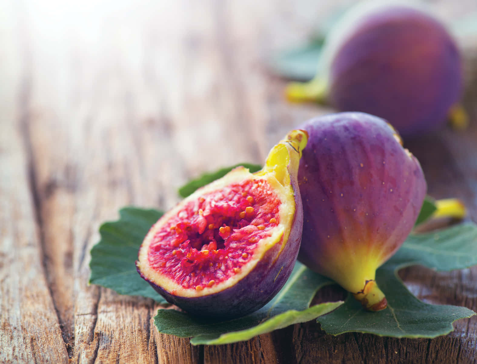Enjoy the sweet taste of fresh purple figs Wallpaper